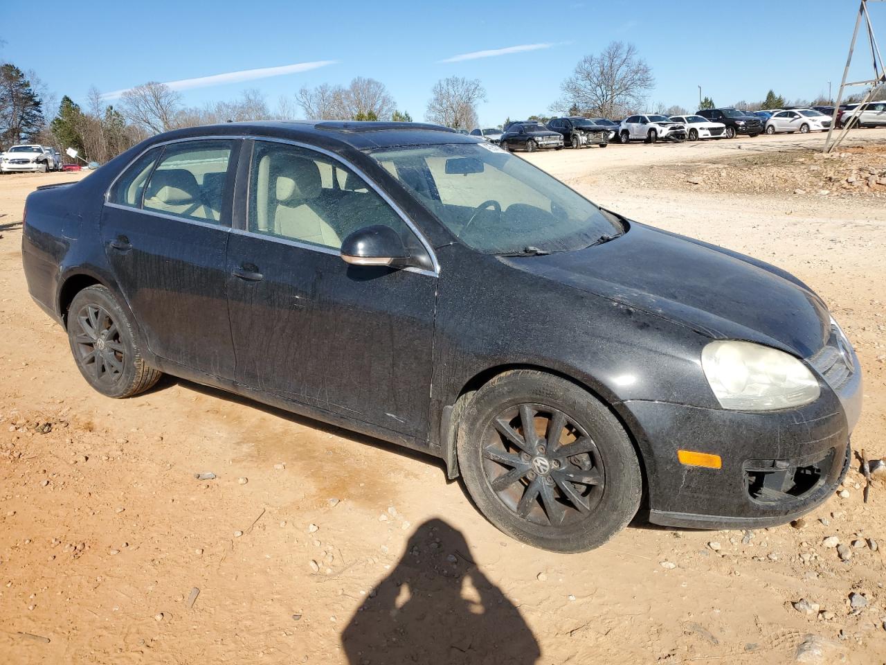 2010 Volkswagen Jetta VIN 3VWRX7AJ8AM058677 Copart auction photo, all over damage thumbnail 4