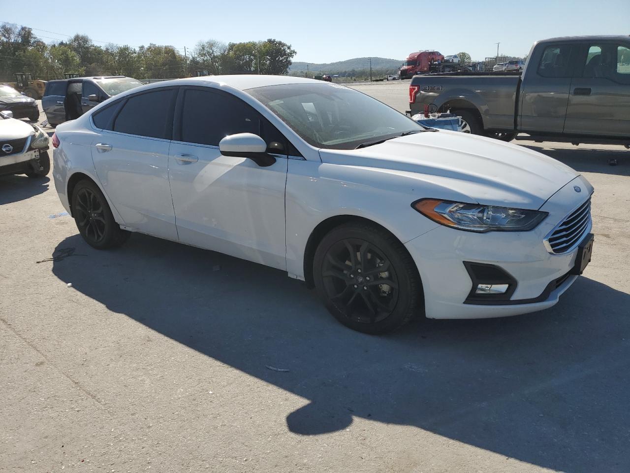 2020 Ford Fusion VIN 3FA6P0HD7LR169343 Copart auction photo, front end / side damage thumbnail 4