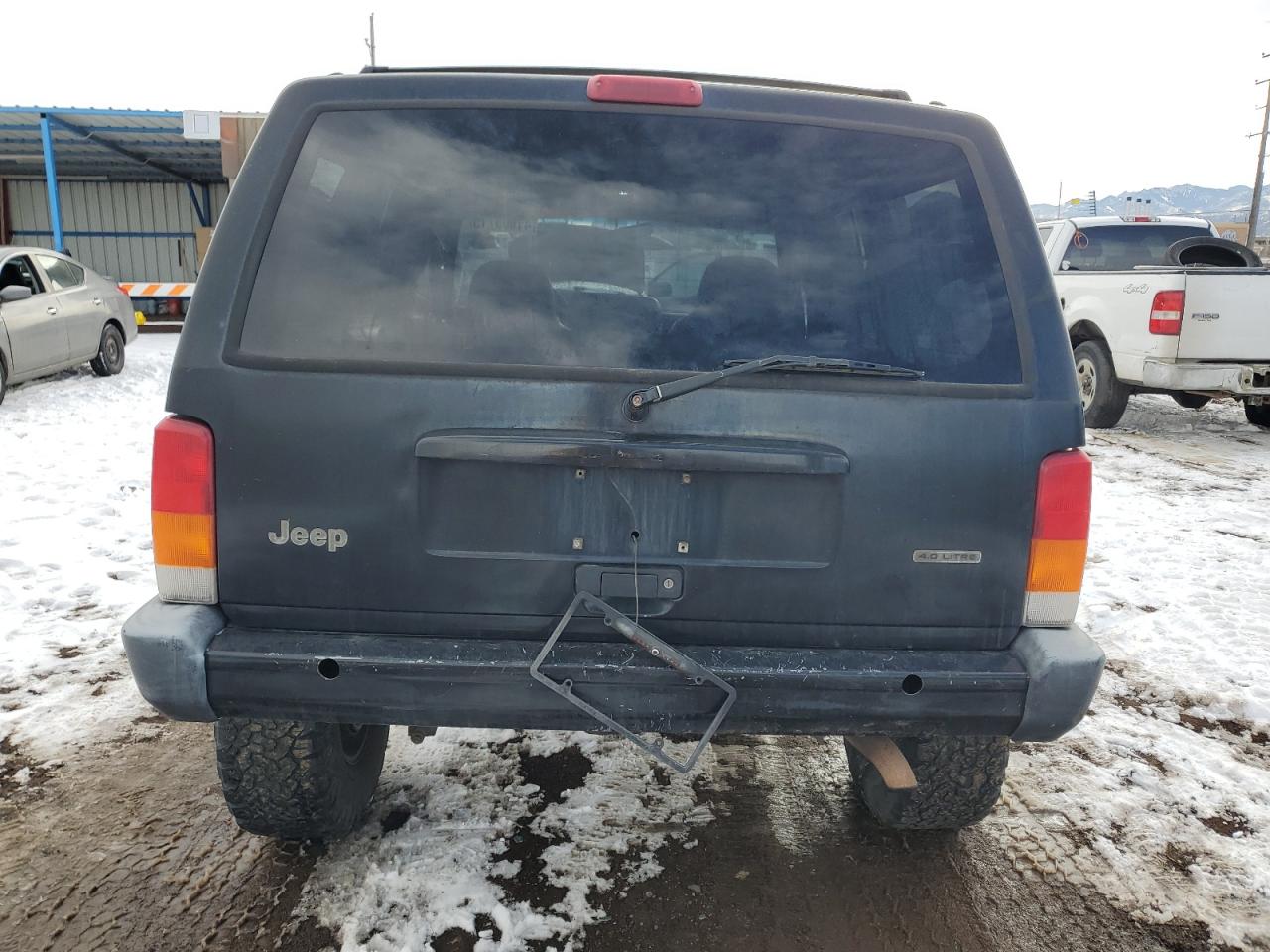 2000 Jeep Grand Cherokee VIN 1J4FF48S9YL205293 Copart auction photo, side / front end damage thumbnail 6
