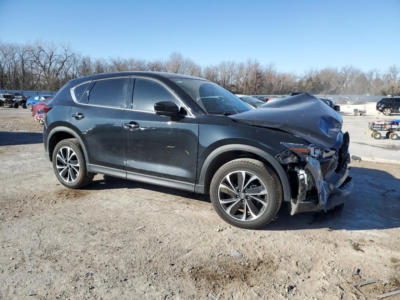 2023 Mazda CX-5 VIN JM3KFBDM2P0198680 Copart auction photo, front end / minor dent/scratches damage thumbnail 4