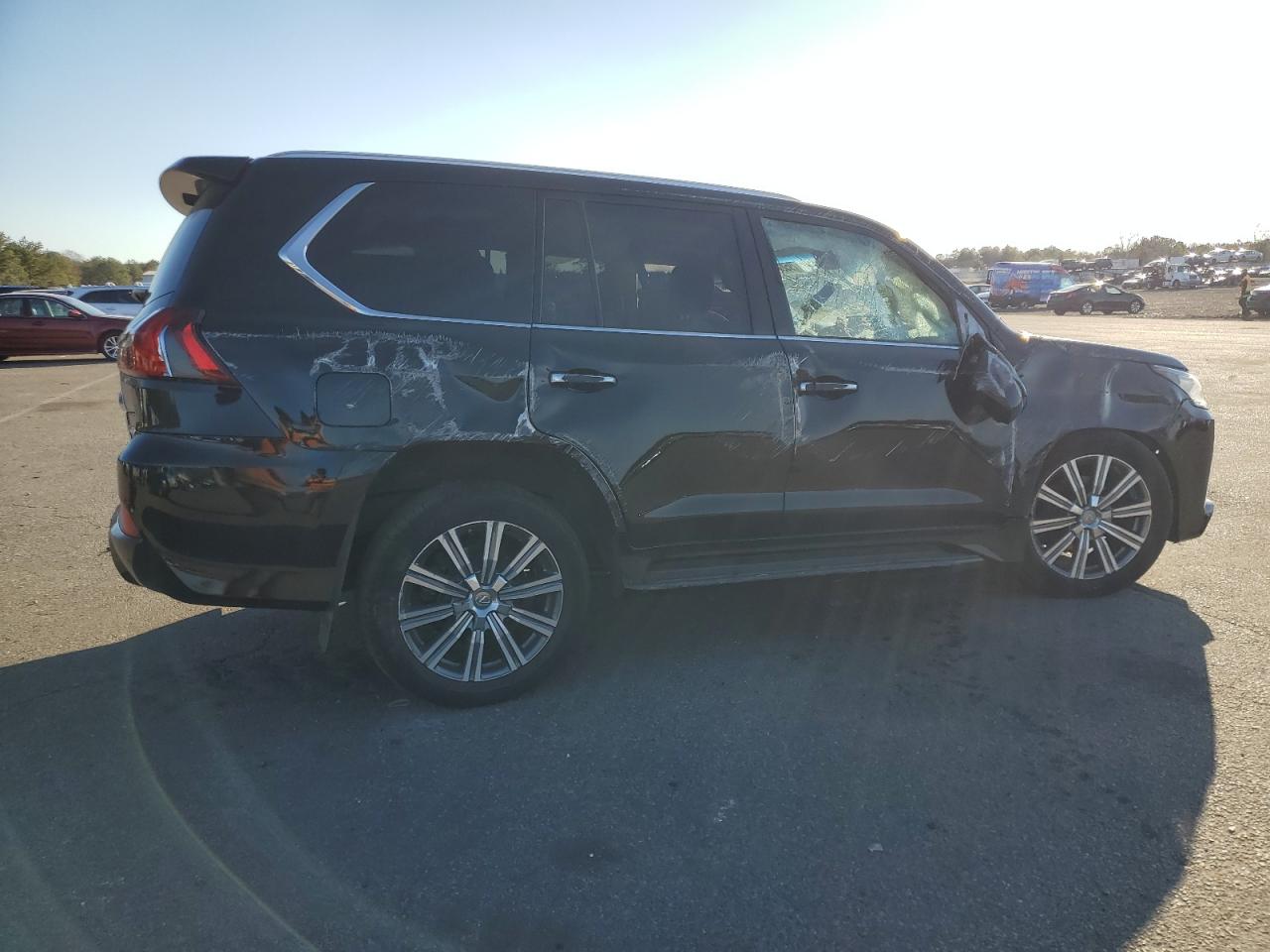 2016 Lexus LX VIN JTJHY7AX7G4217318 Copart auction photo, rollover / minor dent/scratches damage thumbnail 3