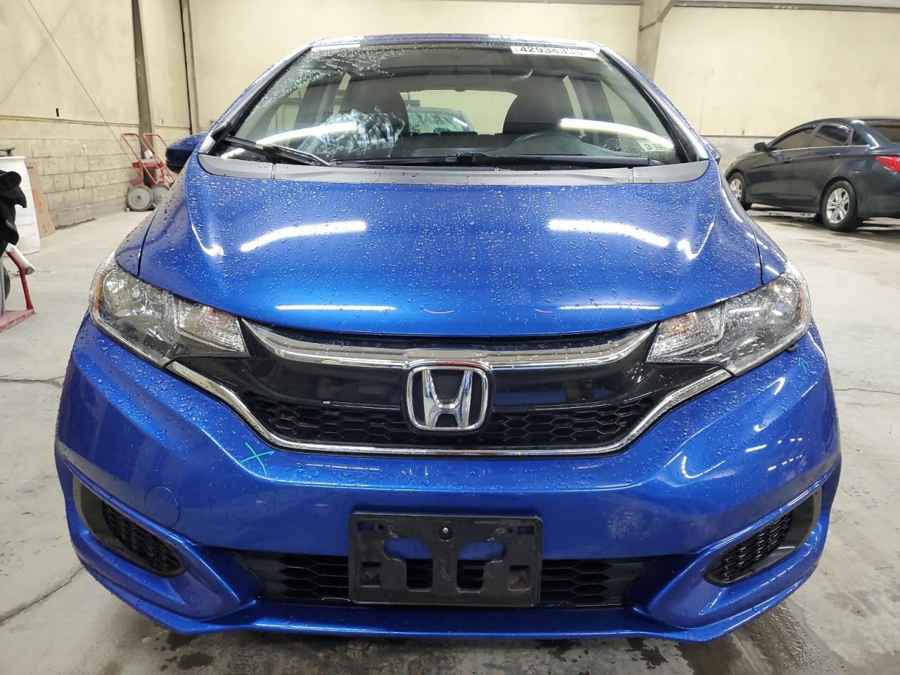 2020 Honda Fit VIN 3HGGK5H46LM716983 Copart auction photo, rear end / minor dent/scratches damage thumbnail 5