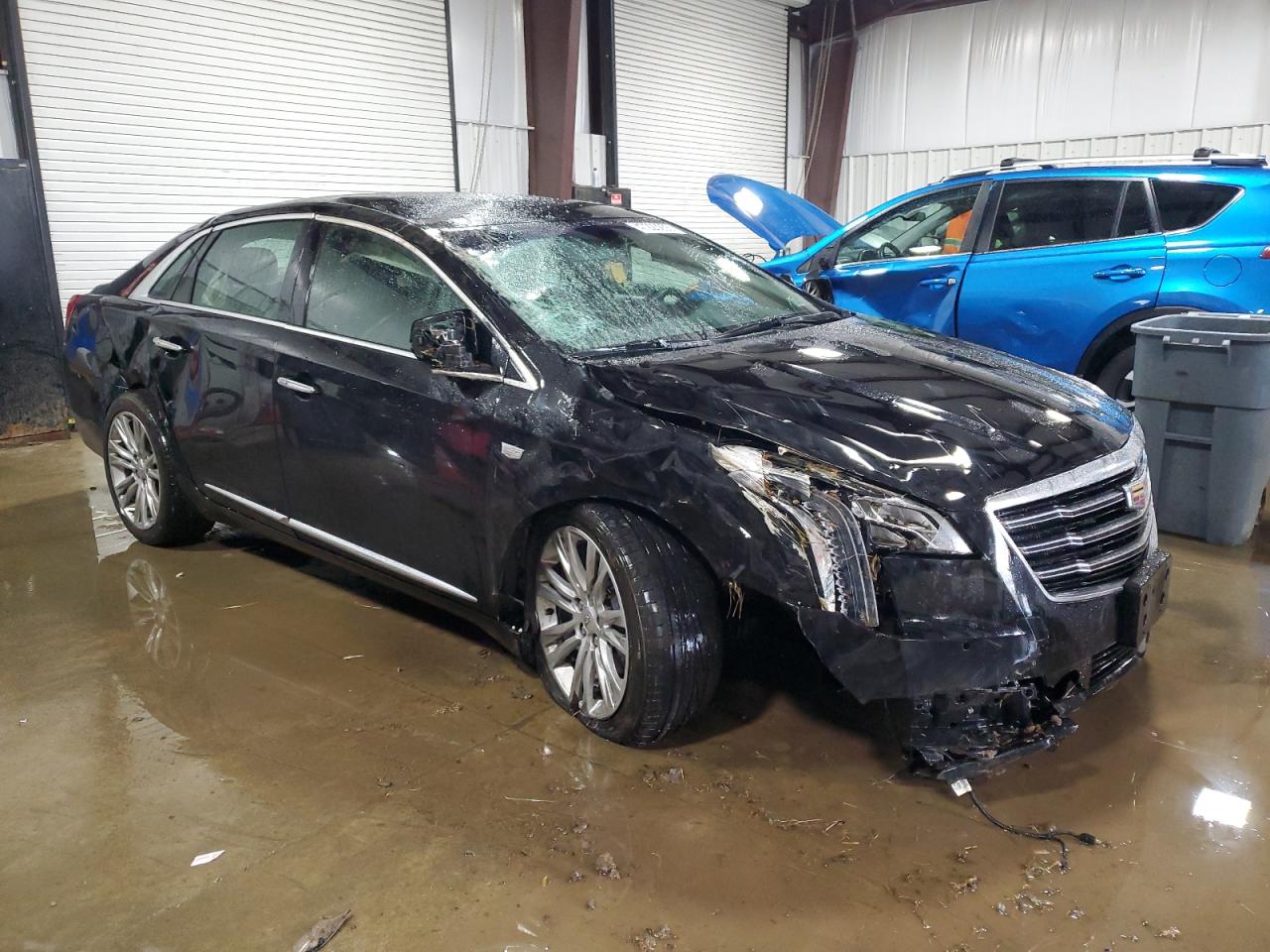 2019 Cadillac XTS VIN 2G61M5S33K9150810 Copart auction photo, rollover damage thumbnail 4