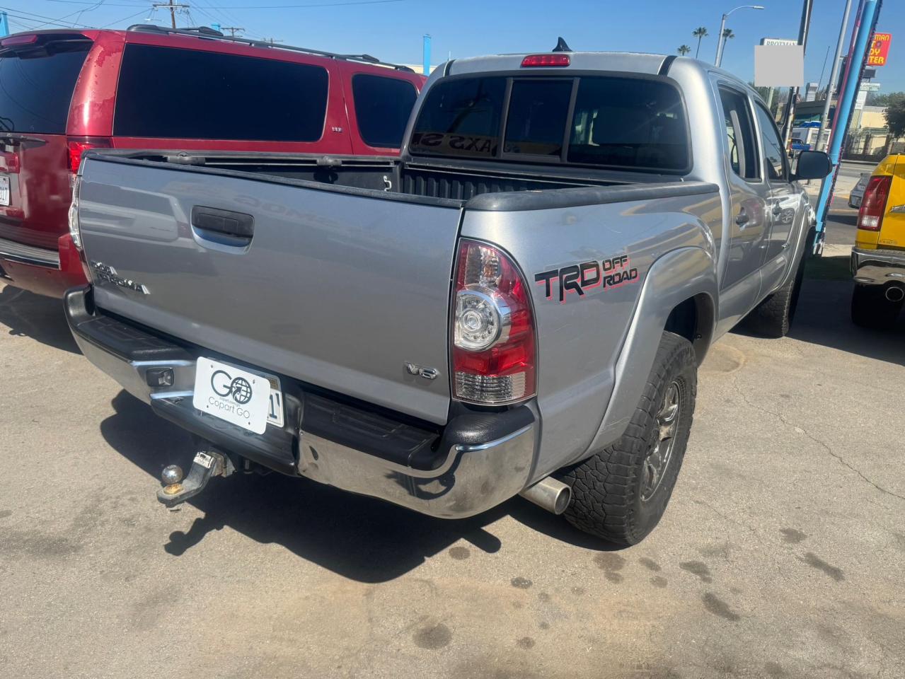 2015 Toyota Tacoma VIN 3TMLU4EN4FM166668 Copart auction photo, minor dent/scratches / normal wear damage thumbnail 4