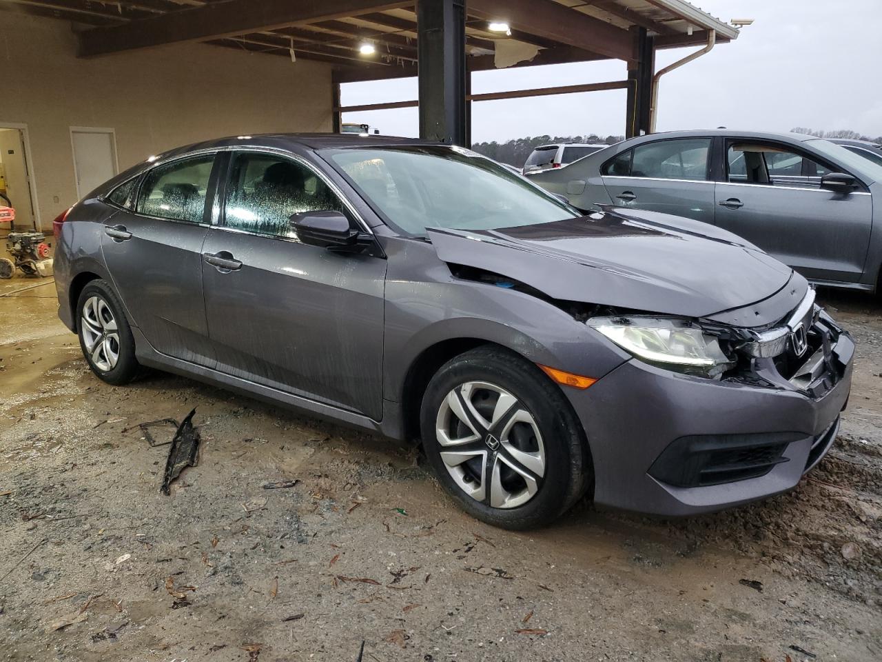 2016 Honda Civic VIN 19XFC2F5XGE057131 Copart auction photo, front end damage thumbnail 4