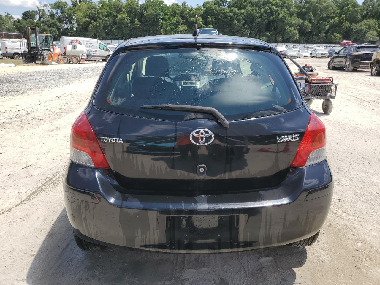 2009 Toyota Yaris VIN JTDJT903095248873 Copart auction photo, front end / side damage thumbnail 6