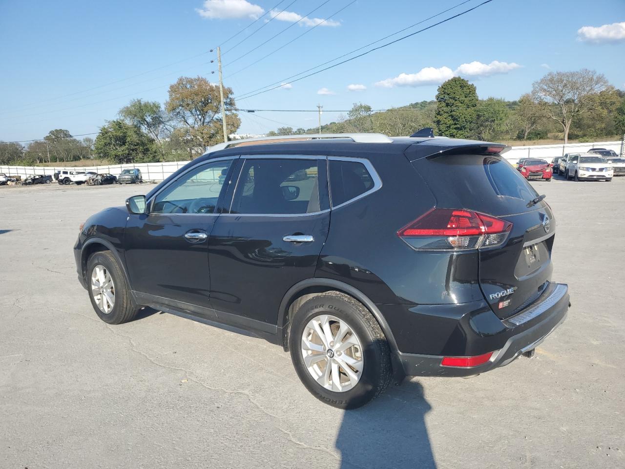 2018 Nissan Rogue VIN 5N1AT2MT3JC852818 Copart auction photo, side / rear end damage thumbnail 2