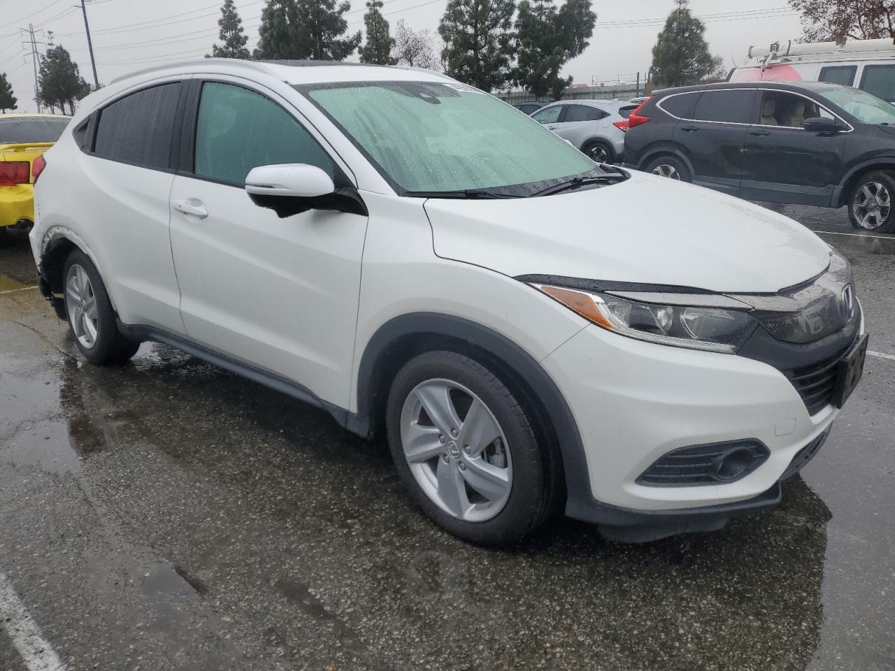 2019 Honda HR-V VIN 3CZRU5H57KM721662 Copart auction photo, side damage thumbnail 4