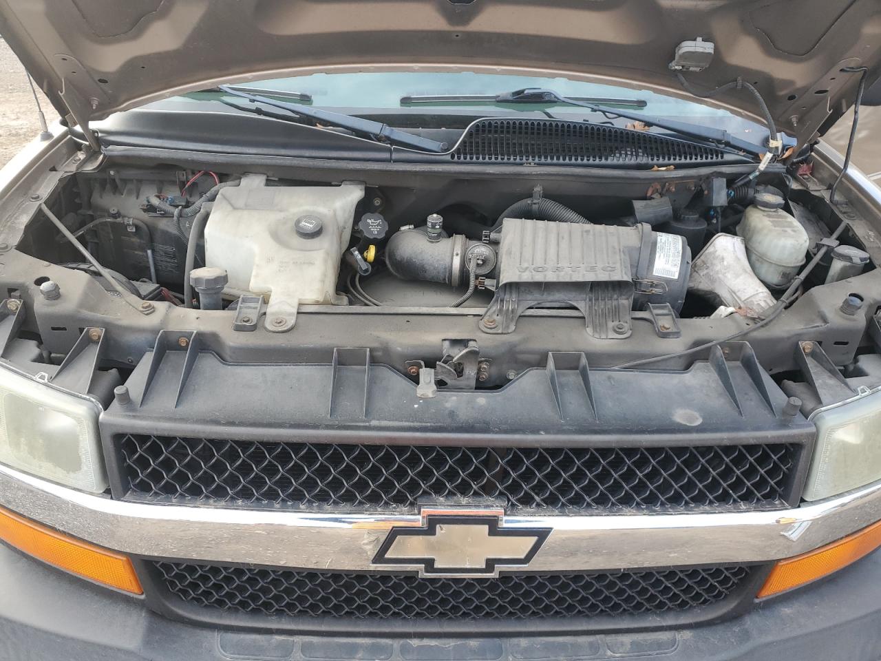 2004 Chevrolet Express VIN 1GBFG15X641214559 Copart auction photo, side / all over damage thumbnail 14