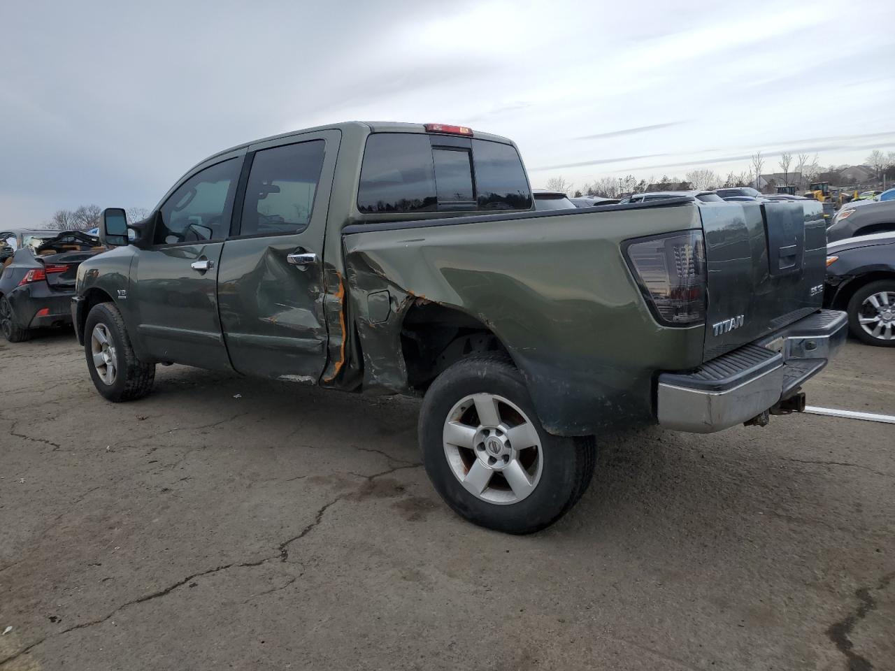 2004 Nissan Titan VIN 1N6AA07B64N563682 Copart auction photo, rear end / side damage thumbnail 2