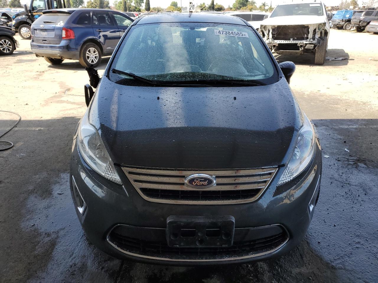 2011 Ford Fiesta VIN 3FADP4CJ7BM221884 Copart auction photo, side / front end damage thumbnail 5