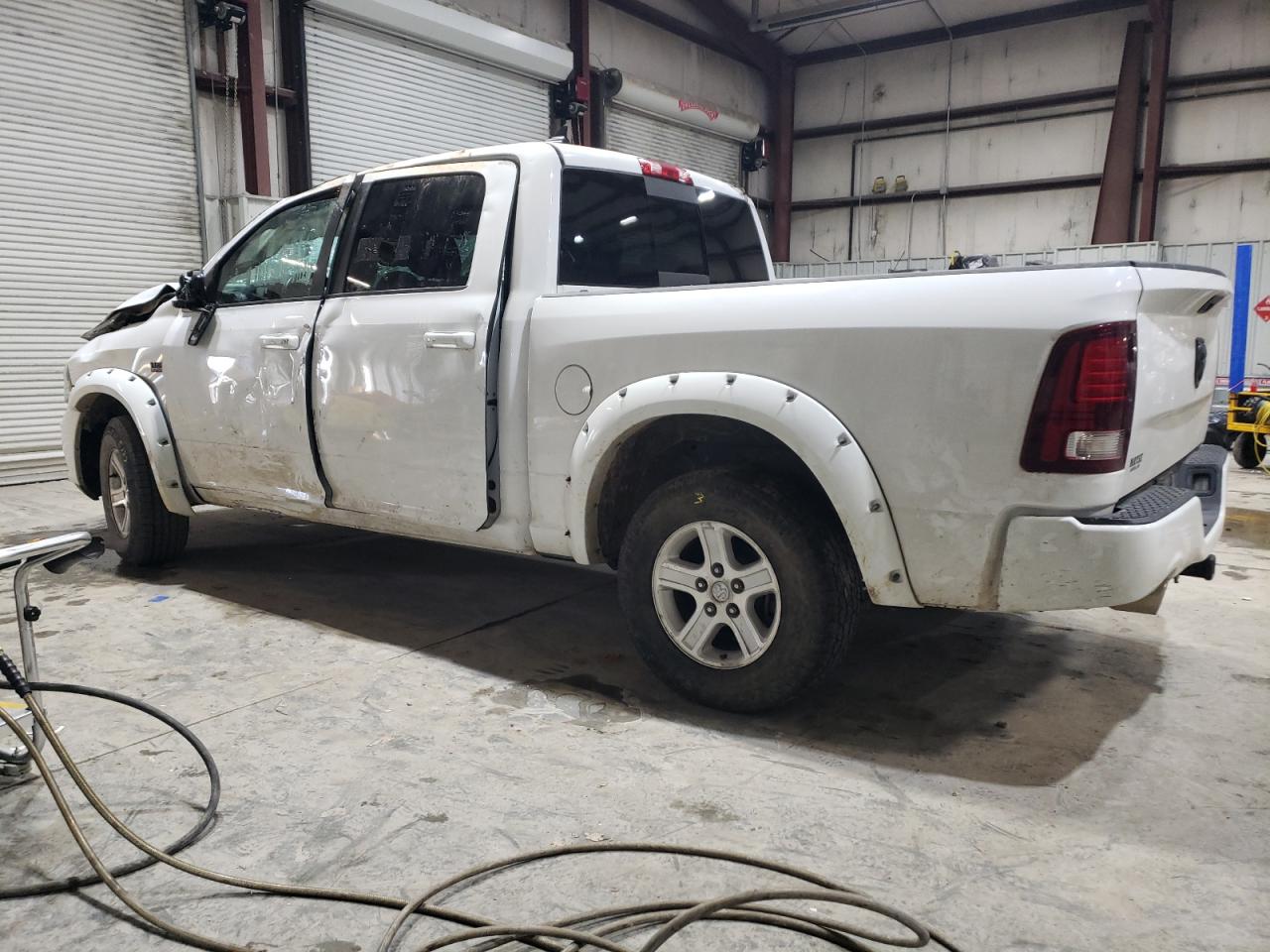 2015 RAM 1500 VIN 1C6RR7MTXFS618313 Copart auction photo, rollover damage thumbnail 2
