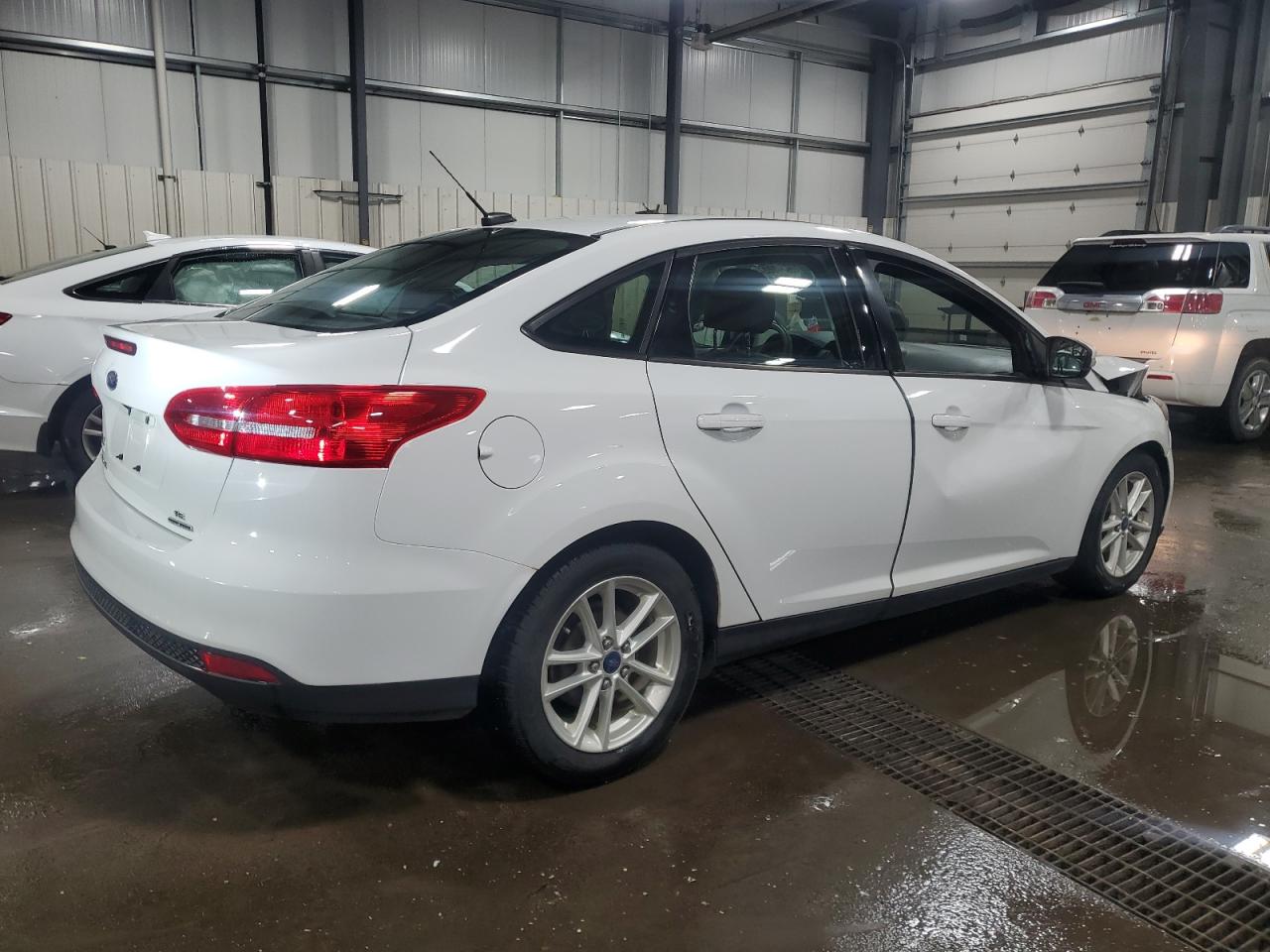 2015 Ford Focus VIN 1FADP3F28FL384128 Copart auction photo, front end / side damage thumbnail 3