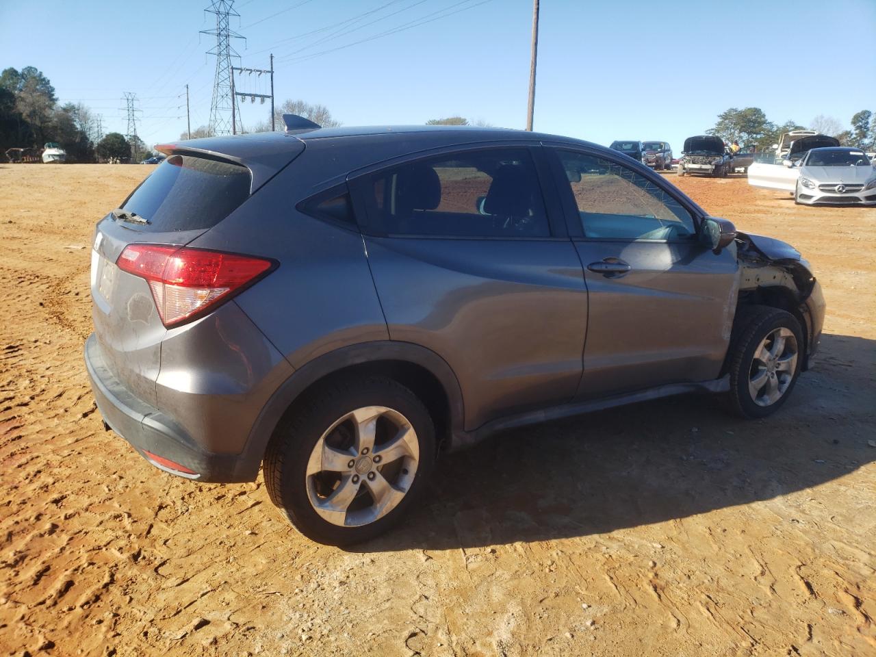 2016 Honda HR-V VIN 3CZRU5H58GM734525 Copart auction photo, front end / side damage thumbnail 3