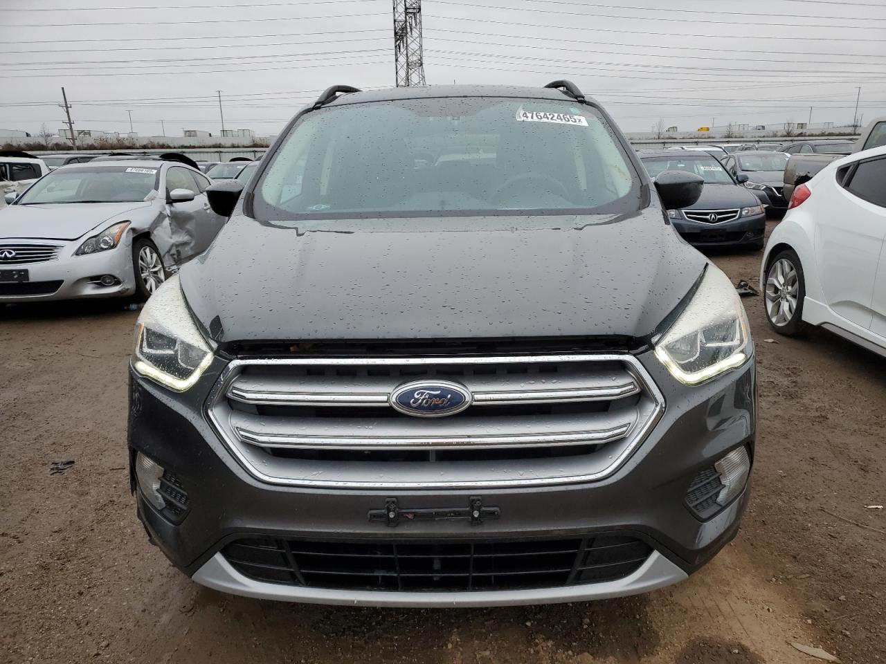 2017 Ford Escape VIN 1FMCU9GD8HUD09780 Copart auction photo, water/flood / minor dent/scratches damage thumbnail 5