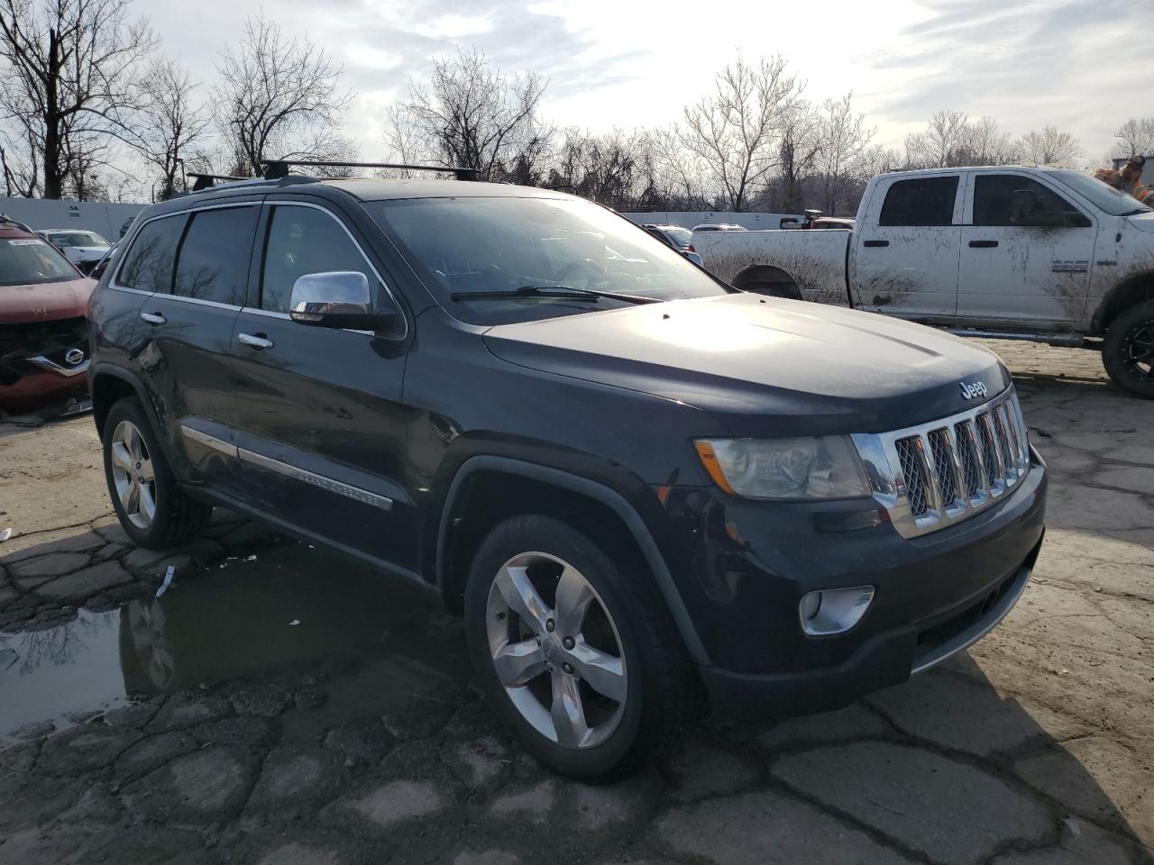 2011 Jeep Grand Cherokee VIN 1J4RR6GT8BC636614 Copart auction photo, side damage thumbnail 4