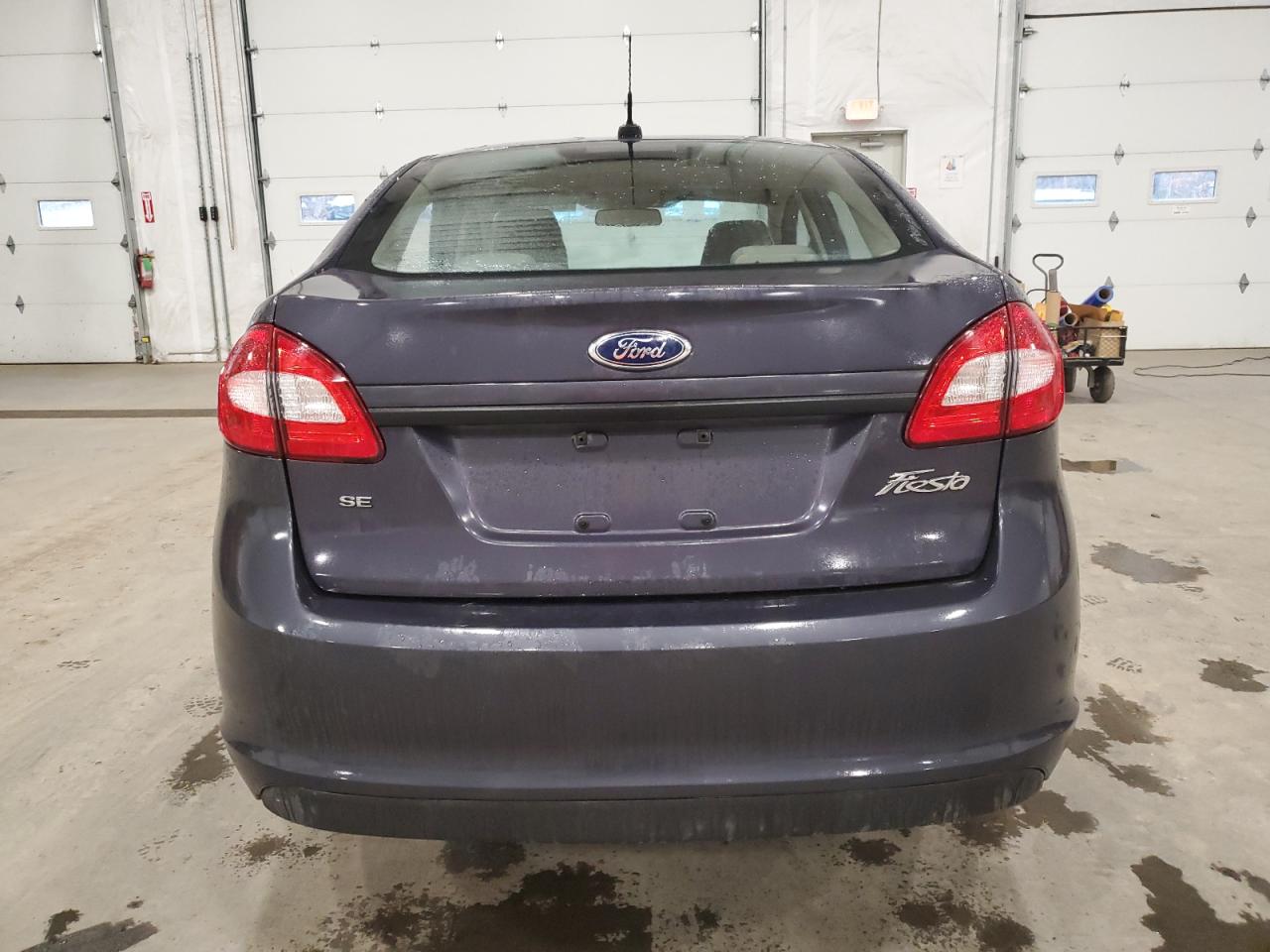 2013 Ford Fiesta VIN 3FADP4BJ1DM157653 Copart auction photo, side / minor dent/scratches damage thumbnail 6