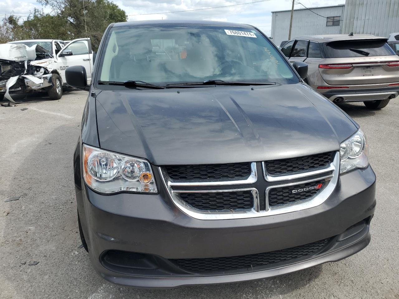 2016 Dodge Caravan VIN 2C4RDGBG5GR348178 Copart auction photo, water/flood damage thumbnail 5