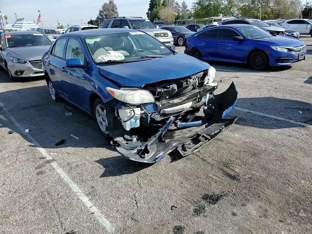 2009 Toyota Corolla VIN JTDBL40E199071705 Copart auction photo, front end / minor dent/scratches damage thumbnail 11