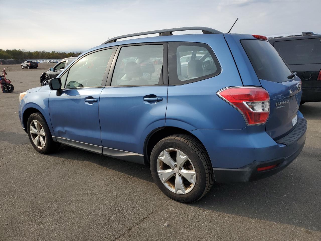 2015 Subaru Forester VIN JF2SJABC3FH474068 Copart auction photo, side / minor dent/scratches damage thumbnail 2