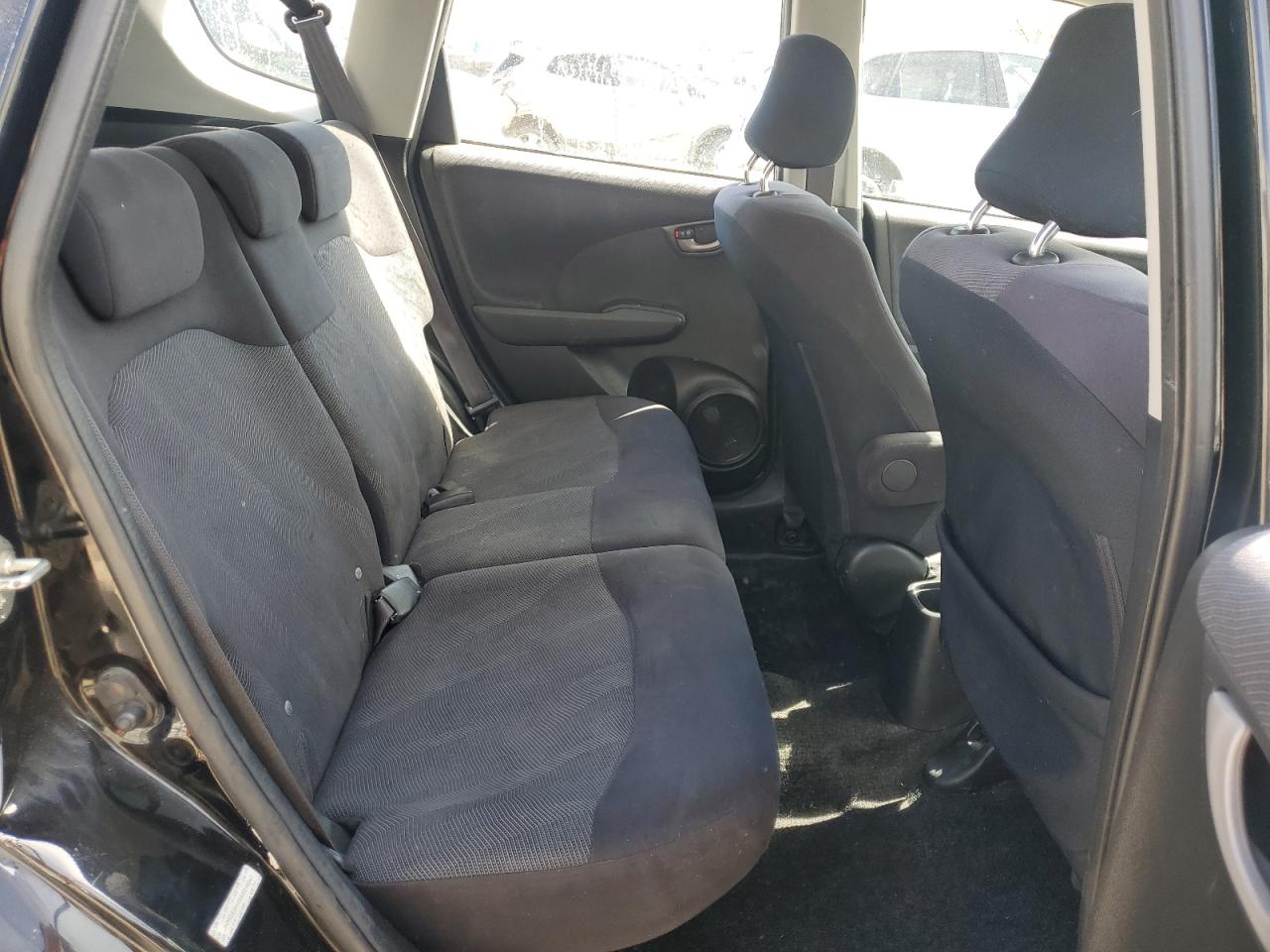 2010 Honda Fit VIN JHMGE8H49AS019947 Copart auction photo, side / rear end damage thumbnail 11