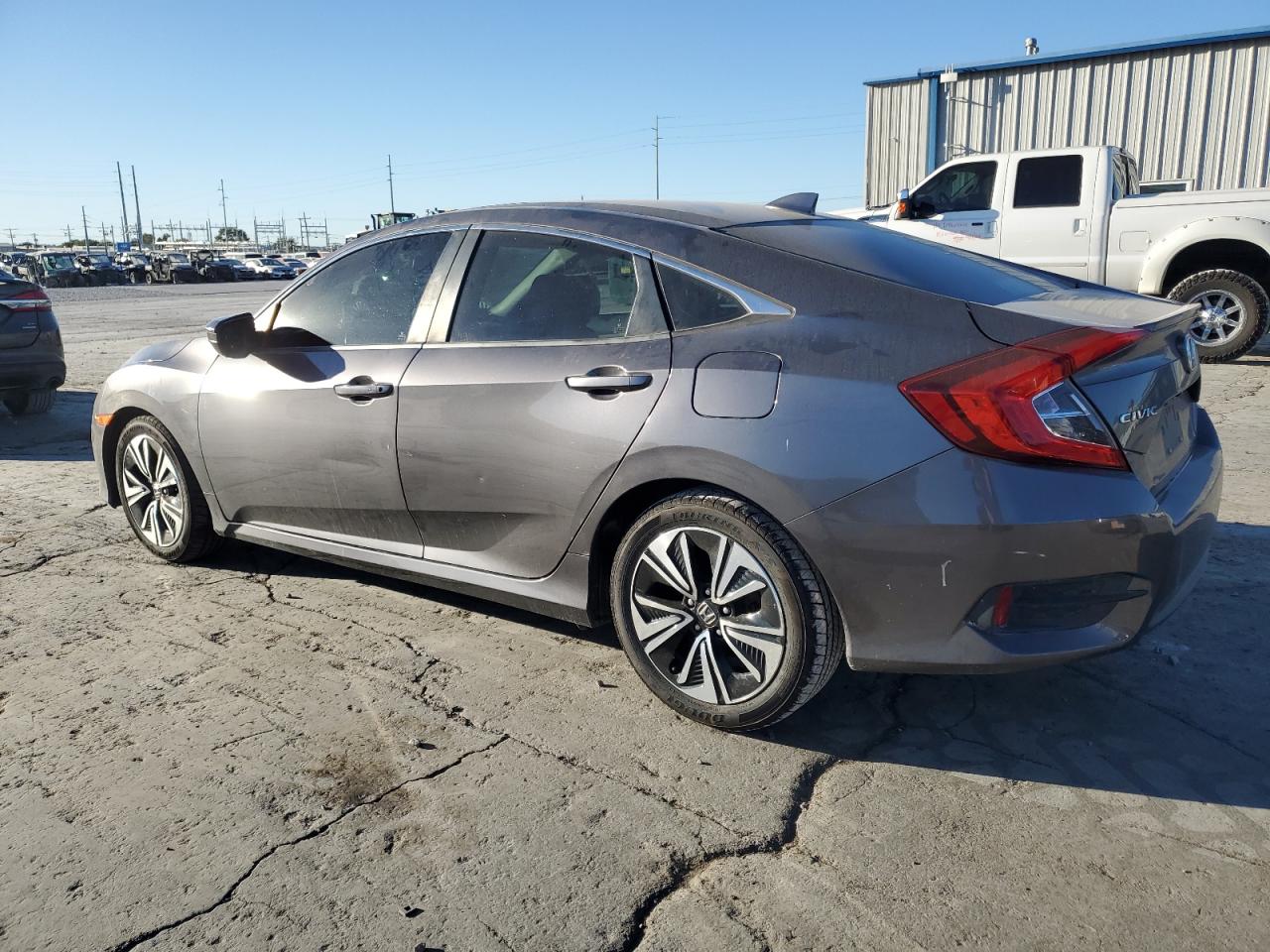 2018 Honda Civic VIN JHMFC1F76JX001107 Copart auction photo, side / minor dent/scratches damage thumbnail 2