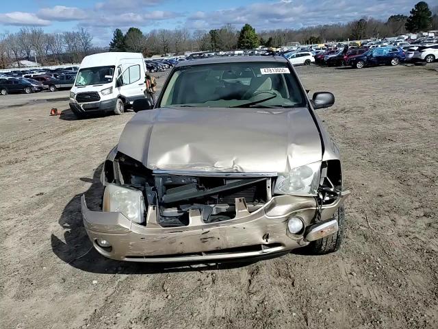 2004 GMC Envoy VIN 1GKDT13SX42403574 Copart auction photo, front end / minor dent/scratches damage thumbnail 11
