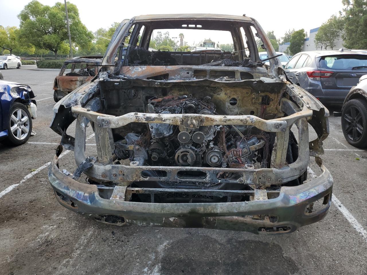 2020 RAM 1500 VIN 1C6SRFJMXLN250010 Copart auction photo, burn damage thumbnail 5