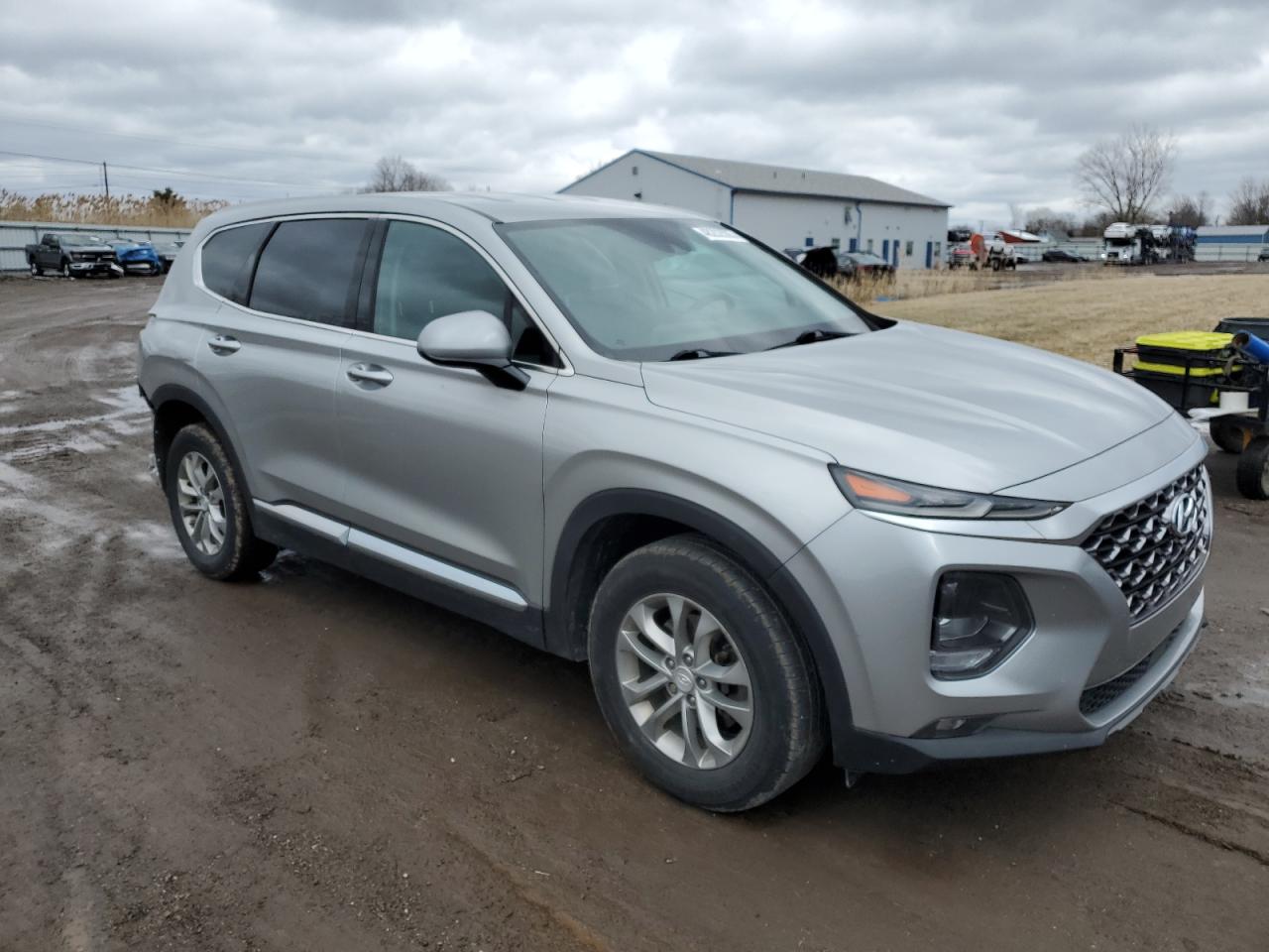 2020 Hyundai Santa Fe VIN 5NMS3CAD3LH203925 Copart auction photo, rear end / undercarriage damage thumbnail 4