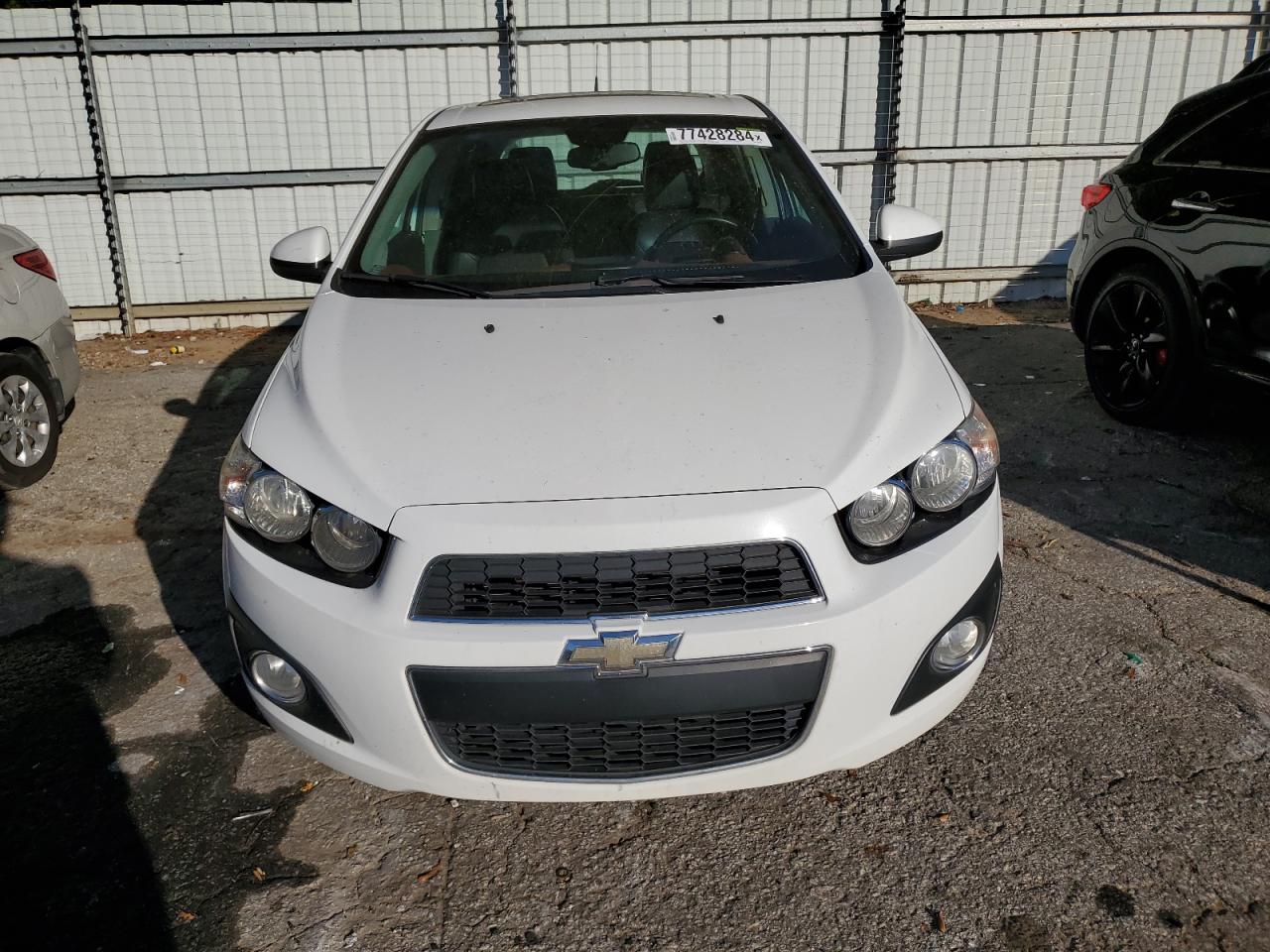 2013 Chevrolet Sonic VIN 1G1JE6SH0D4188134 Copart auction photo, water/flood damage thumbnail 5