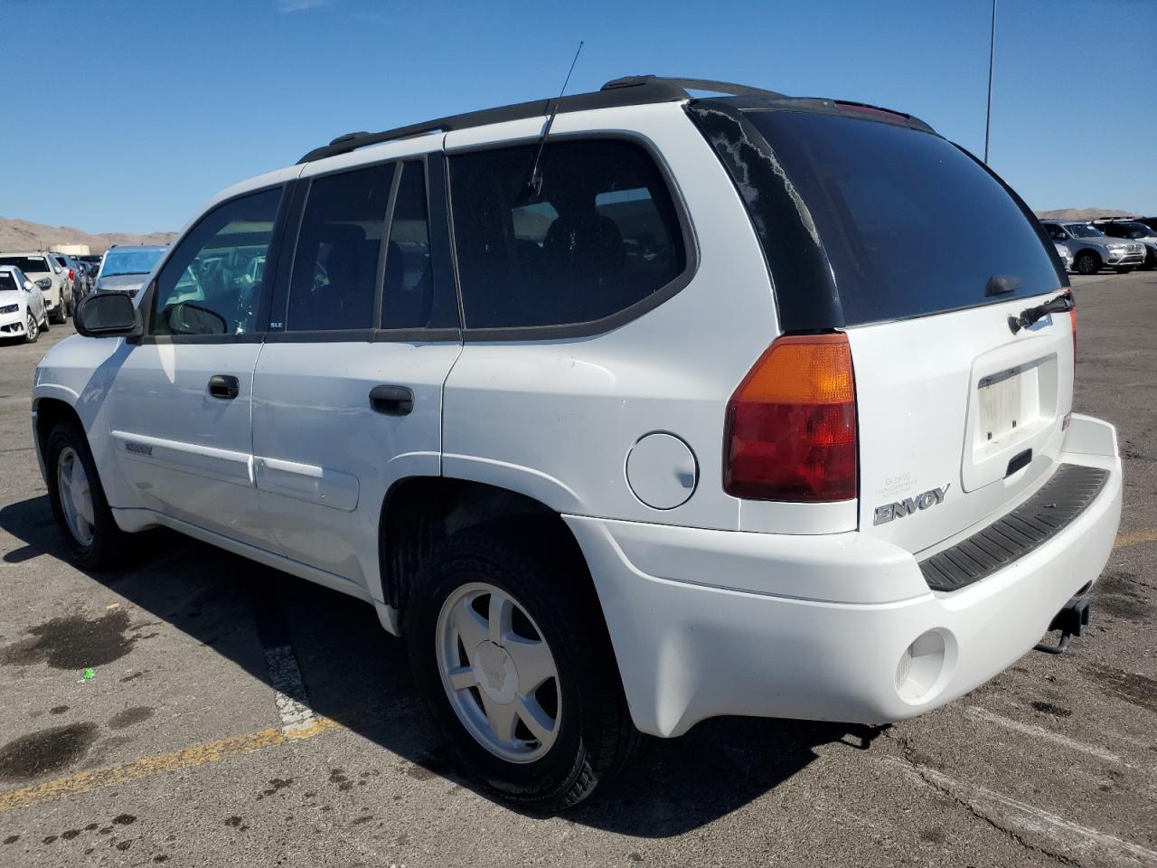 2001 GMC Envoy VIN 1GKDS13S922295223 Copart auction photo, side damage thumbnail 2