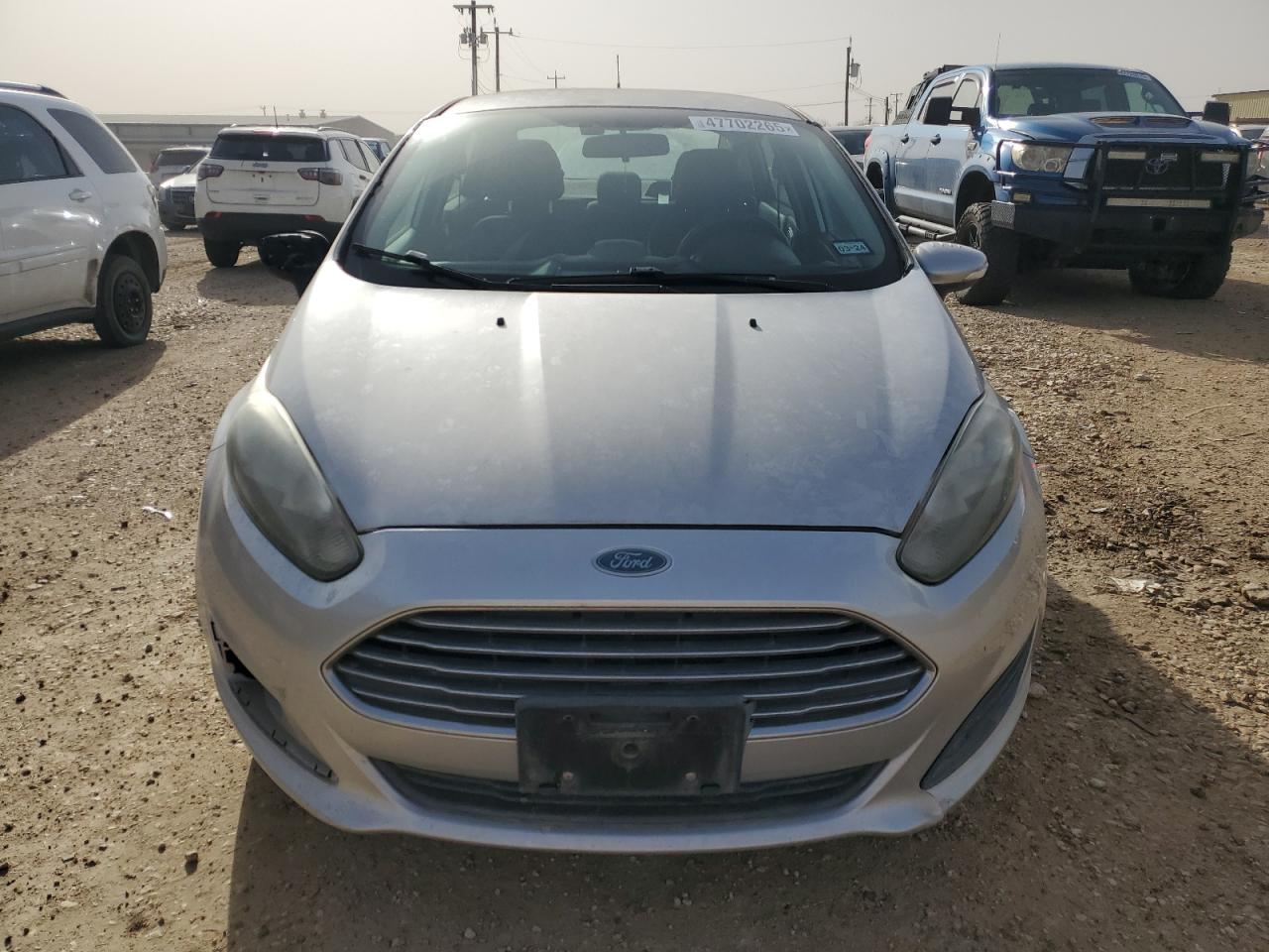 2015 Ford Fiesta VIN 3FADP4BJ7FM126619 Copart auction photo, side / minor dent/scratches damage thumbnail 5