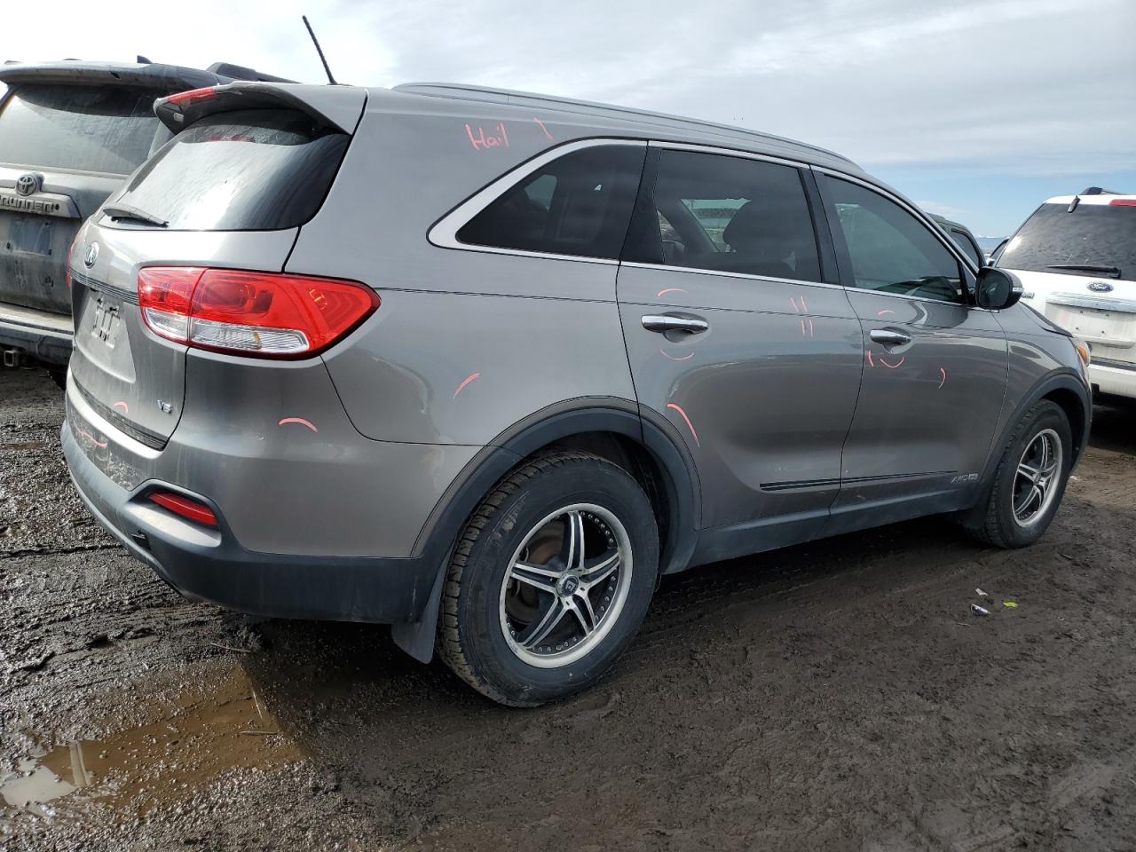 2016 KIA Sorento VIN 5XYPGDA5XGG177560 Copart auction photo, undercarriage / hail damage thumbnail 3