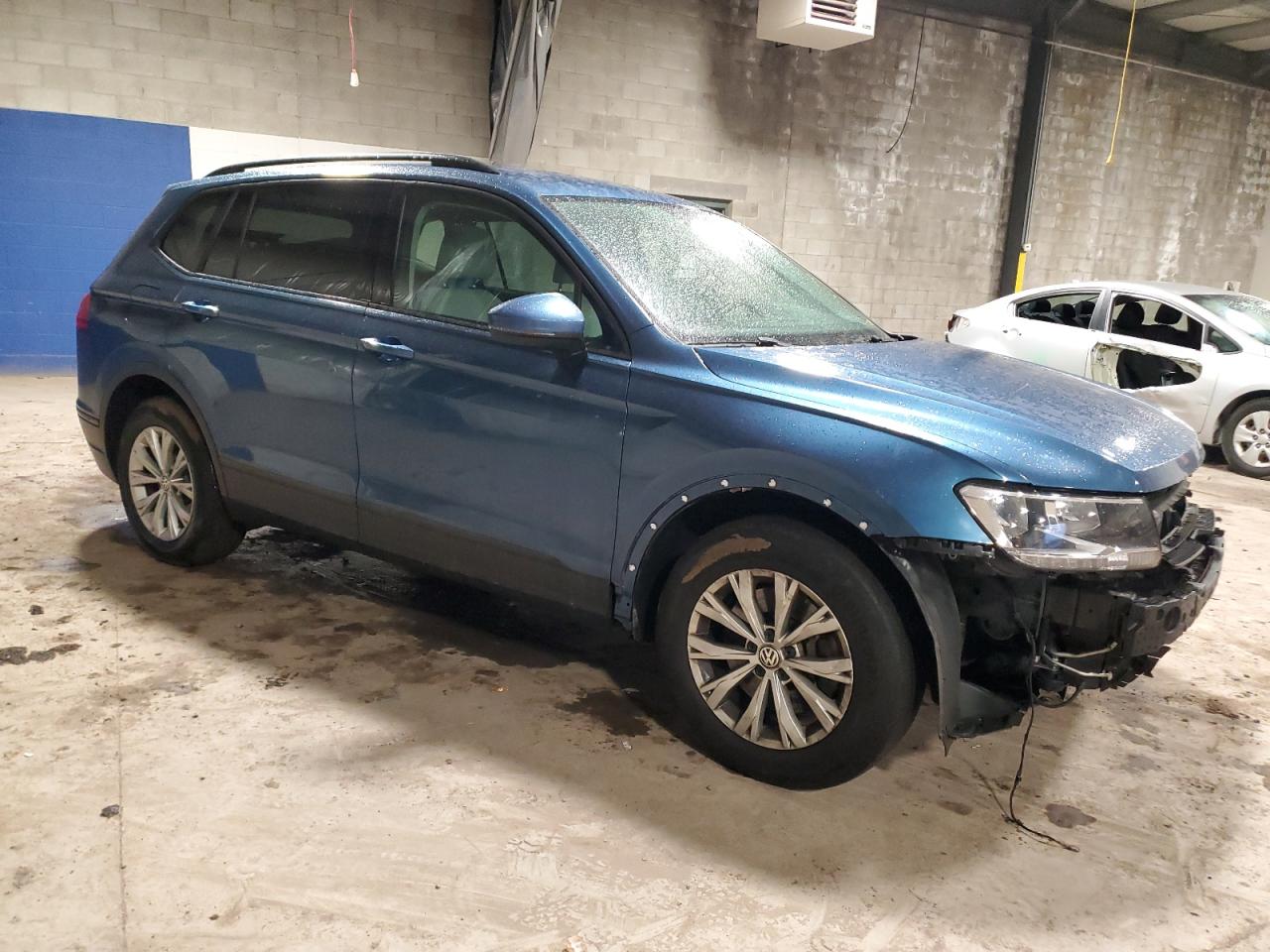2018 Volkswagen Tiguan VIN 3VV0B7AX7JM101048 Copart auction photo, front end / side damage thumbnail 4