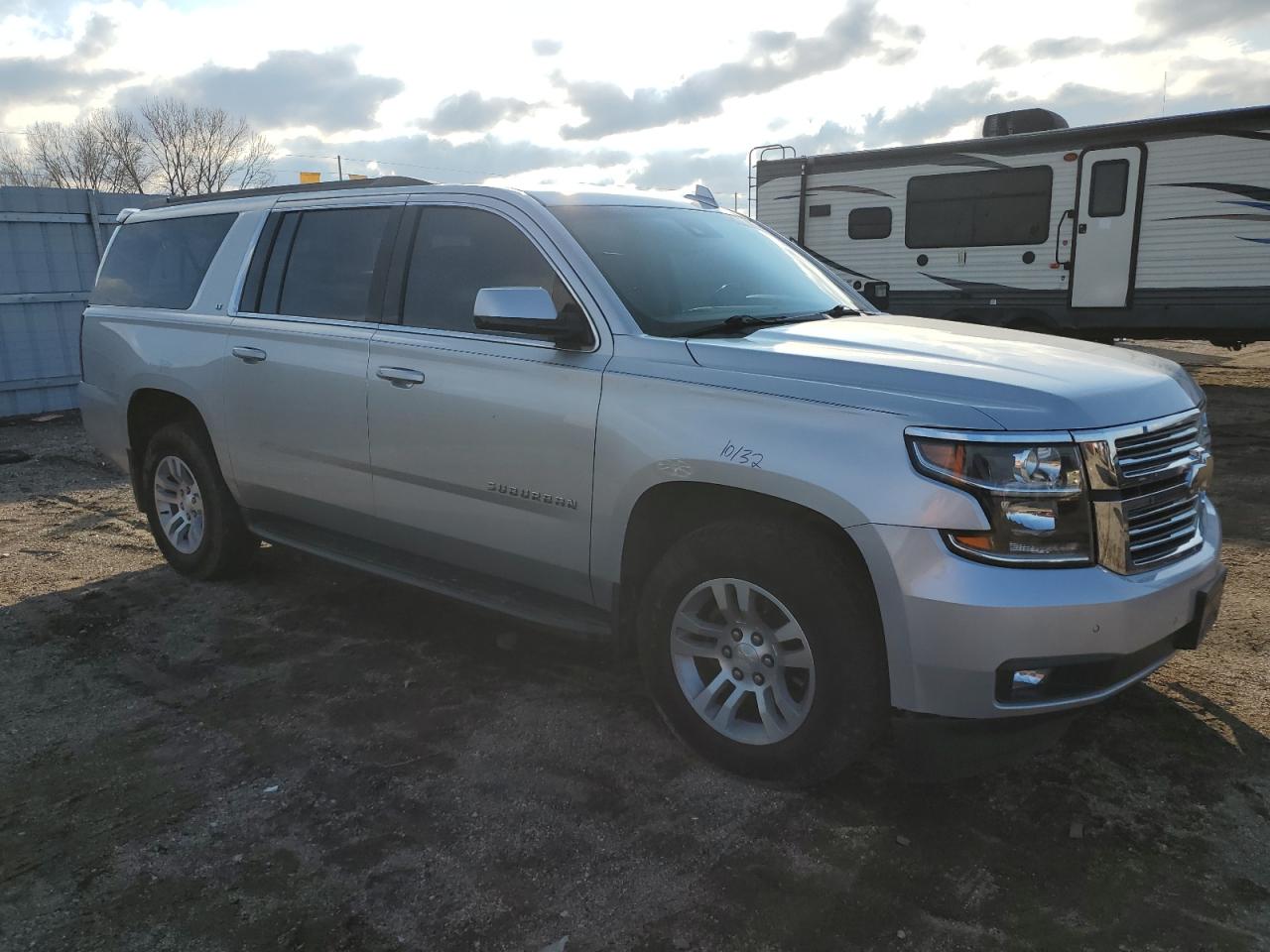 2019 Chevrolet Suburban VIN 1GNSKHKC4KR310747 Copart auction photo, rear end damage thumbnail 4