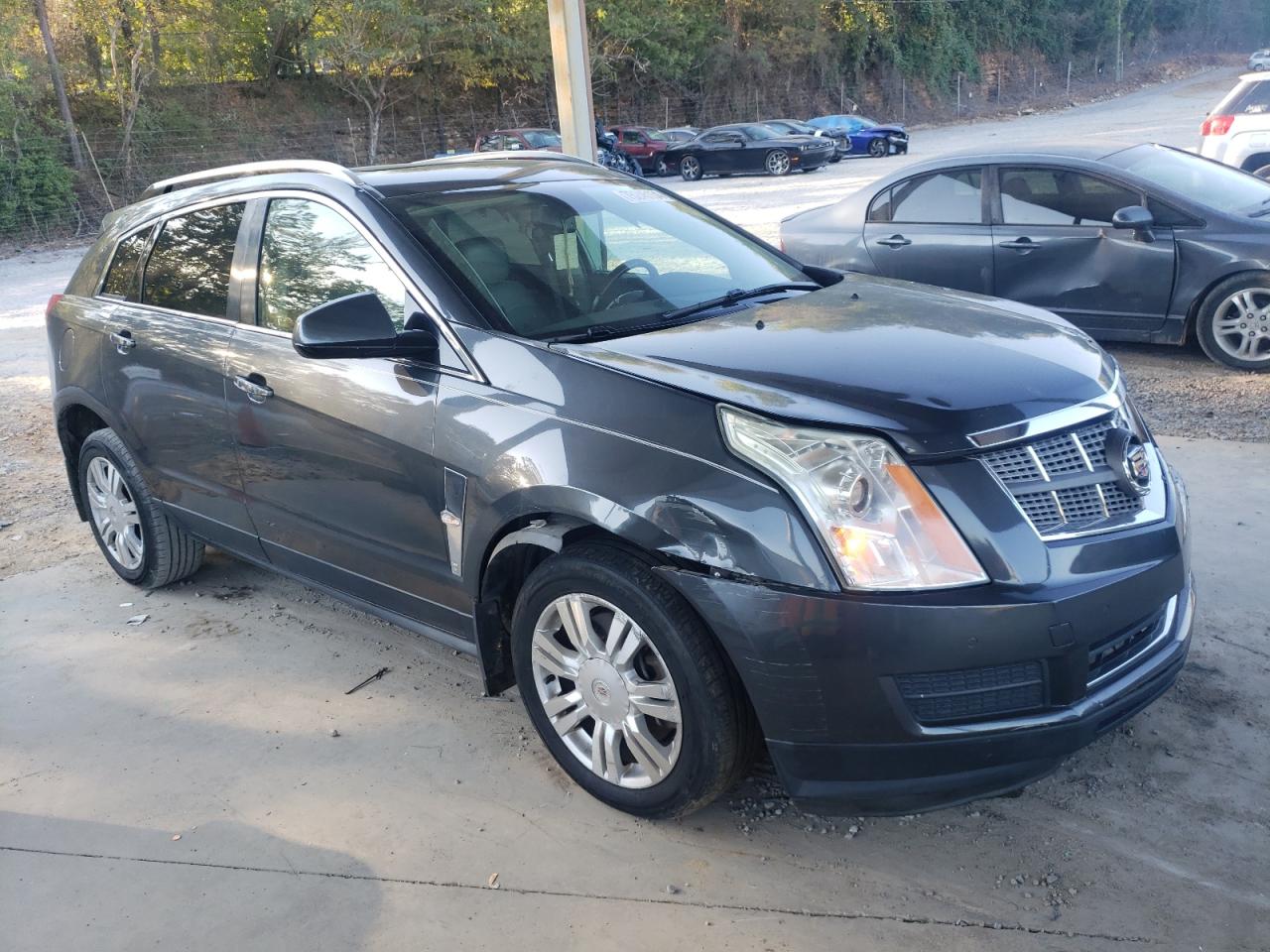 2012 Cadillac SRX VIN 3GYFNAE35CS569258 Copart auction photo, front end damage thumbnail 4