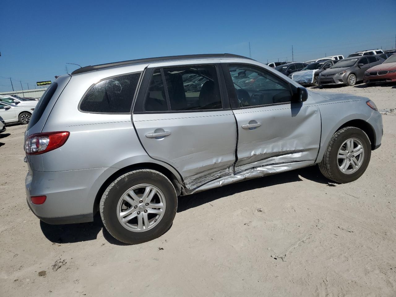 2010 Hyundai Santa Fe VIN 5NMSG3AB6AH394823 Copart auction photo, side / minor dent/scratches damage thumbnail 3