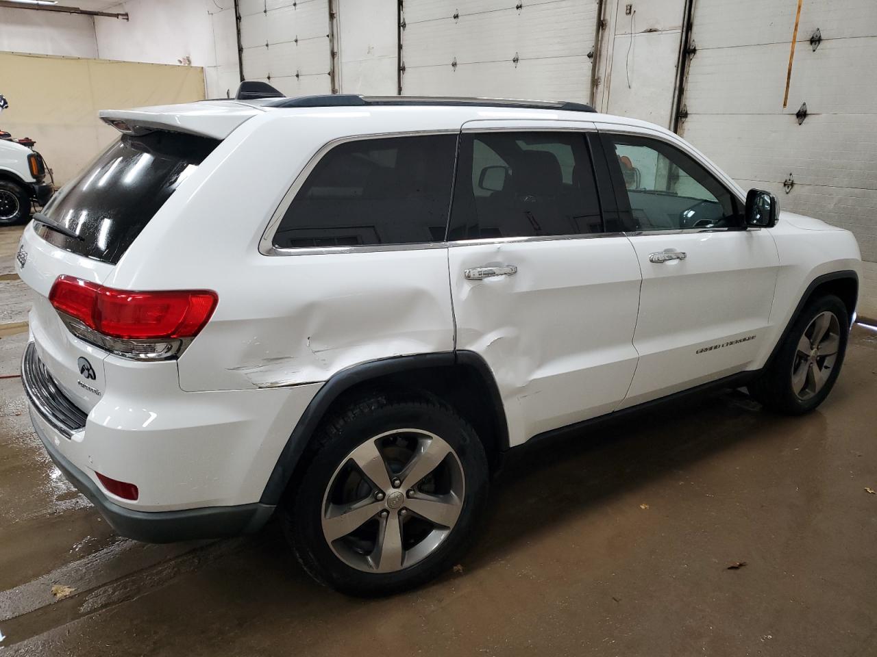 2016 Jeep Grand Cherokee VIN 1C4RJFBG3GC402427 Copart auction photo, side / front end damage thumbnail 3