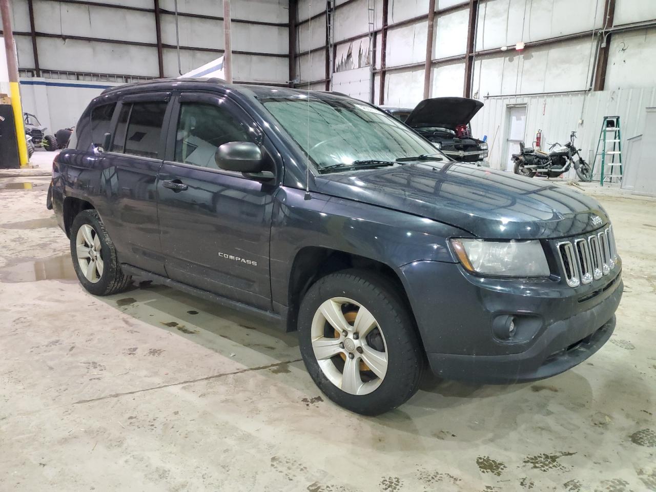 2014 Jeep Compass VIN 1C4NJDBB6ED625415 Copart auction photo, water/flood damage thumbnail 4