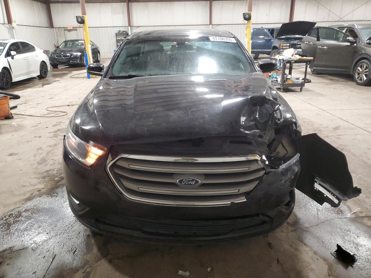 2017 Ford Taurus VIN 1FAHP2H80HG105716 Copart auction photo, side / front end damage thumbnail 5