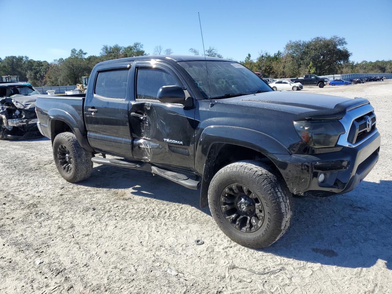 2015 Toyota Tacoma VIN 5TFJU4GN1FX089661 Copart auction photo, side damage thumbnail 4