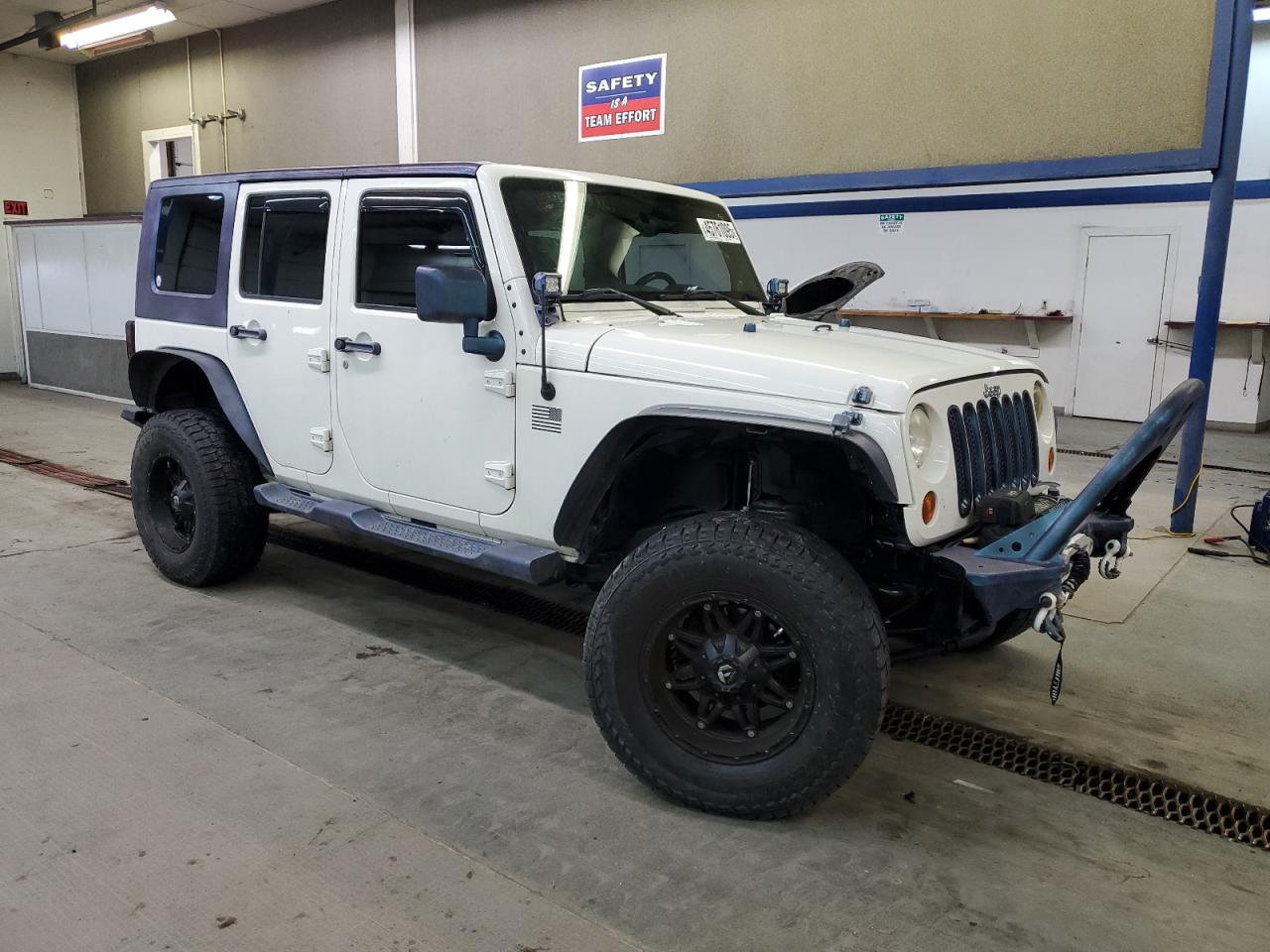 2010 Jeep Wrangler VIN 1J4BA3H17AL119047 Copart auction photo, undercarriage damage thumbnail 4