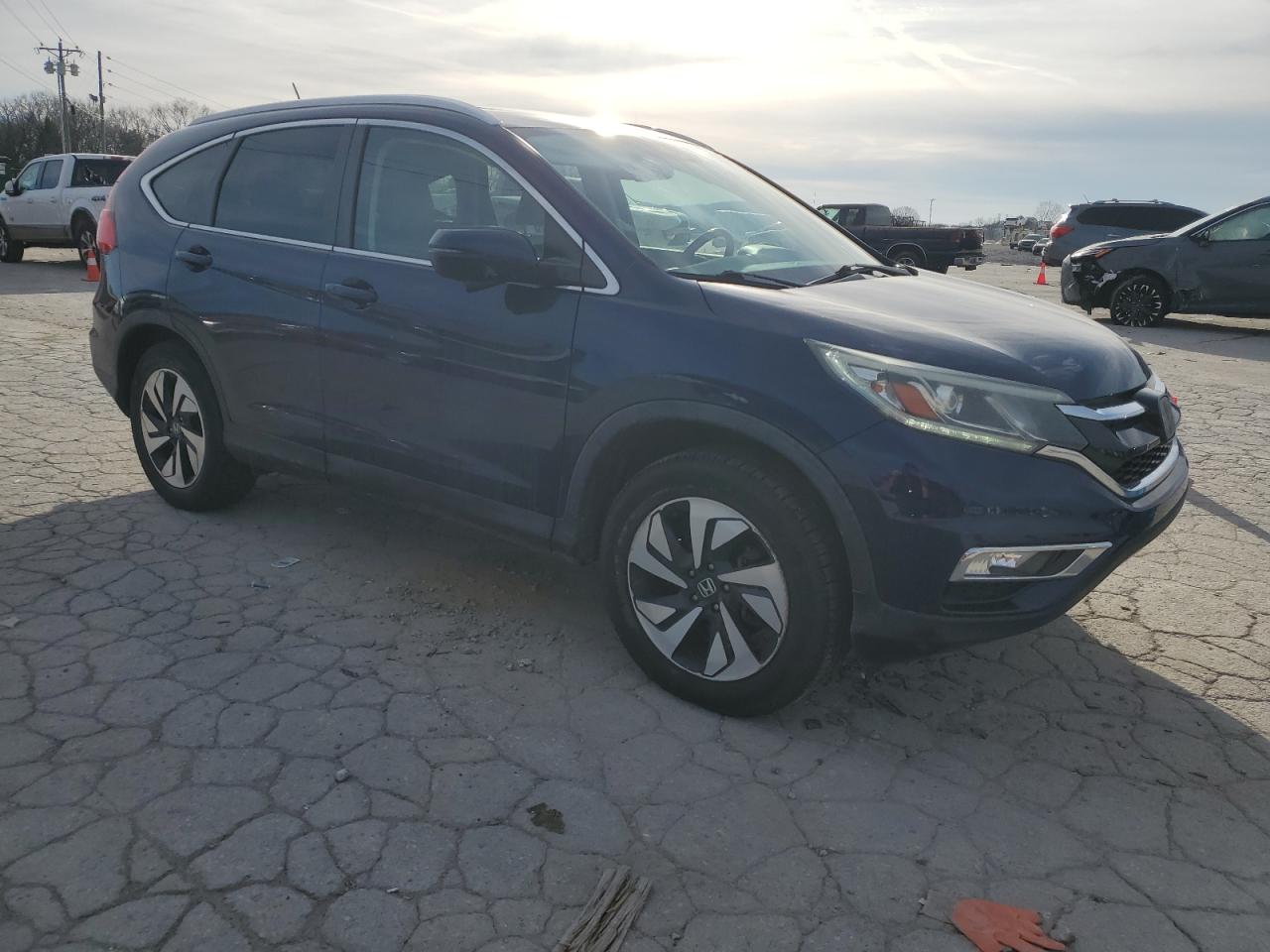 2016 Honda CR-V VIN 5J6RM4H9XGL091061 Copart auction photo, side / minor dent/scratches damage thumbnail 4