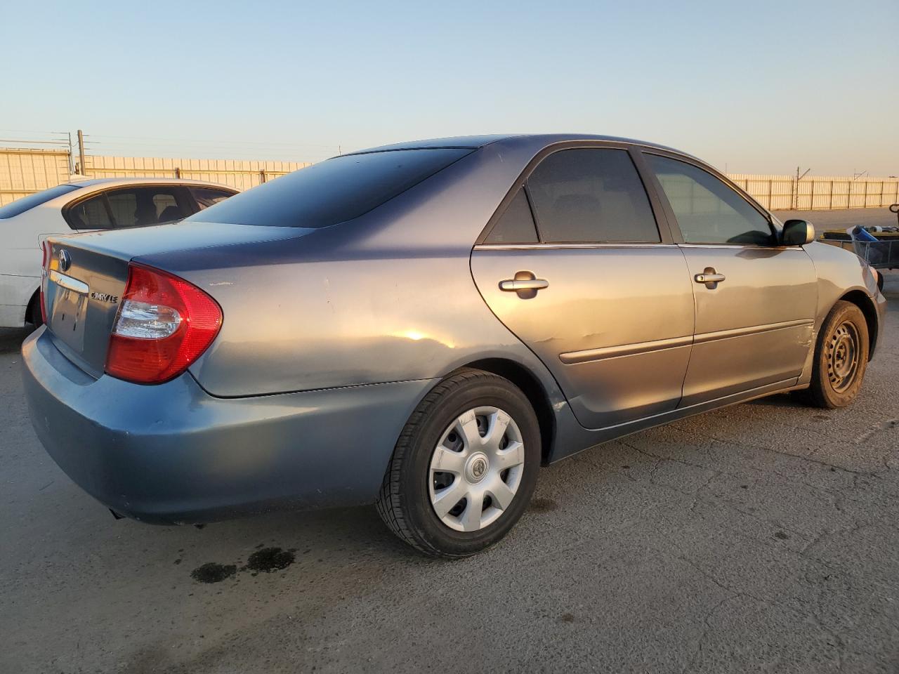 2003 Toyota Camry VIN 4T1BE32K23U677019 Copart auction photo, side damage thumbnail 3