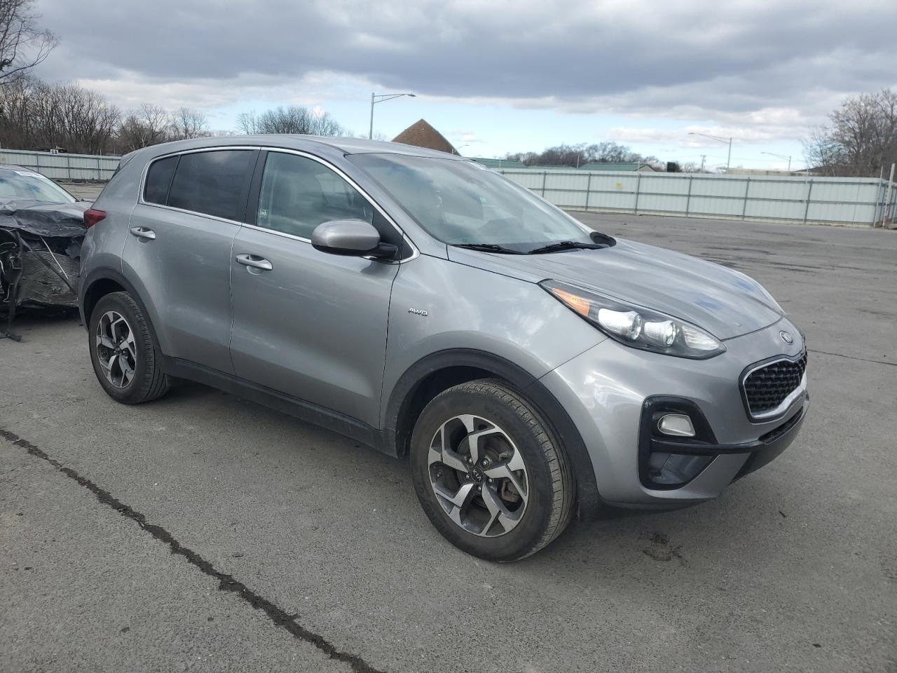 2021 KIA Sportage VIN KNDPMCAC4M7904833 Copart auction photo, vandalism damage thumbnail 4