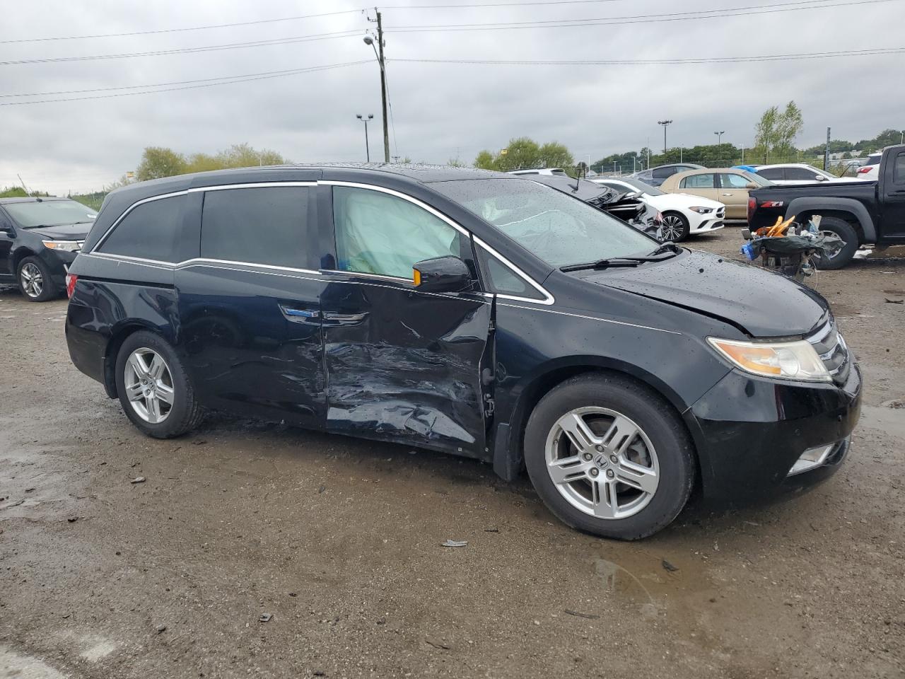 2011 Honda Odyssey VIN 5FNRL5H98BB049739 Copart auction photo, side / minor dent/scratches damage thumbnail 4