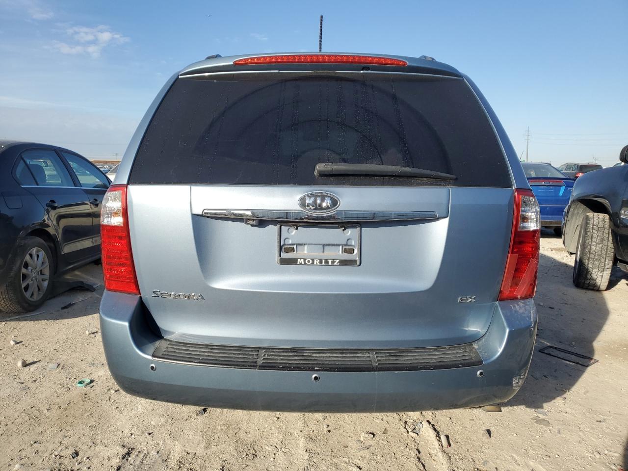 2010 KIA Sedona VIN KNDMH4C3XA6343775 Copart auction photo, rear end damage thumbnail 6