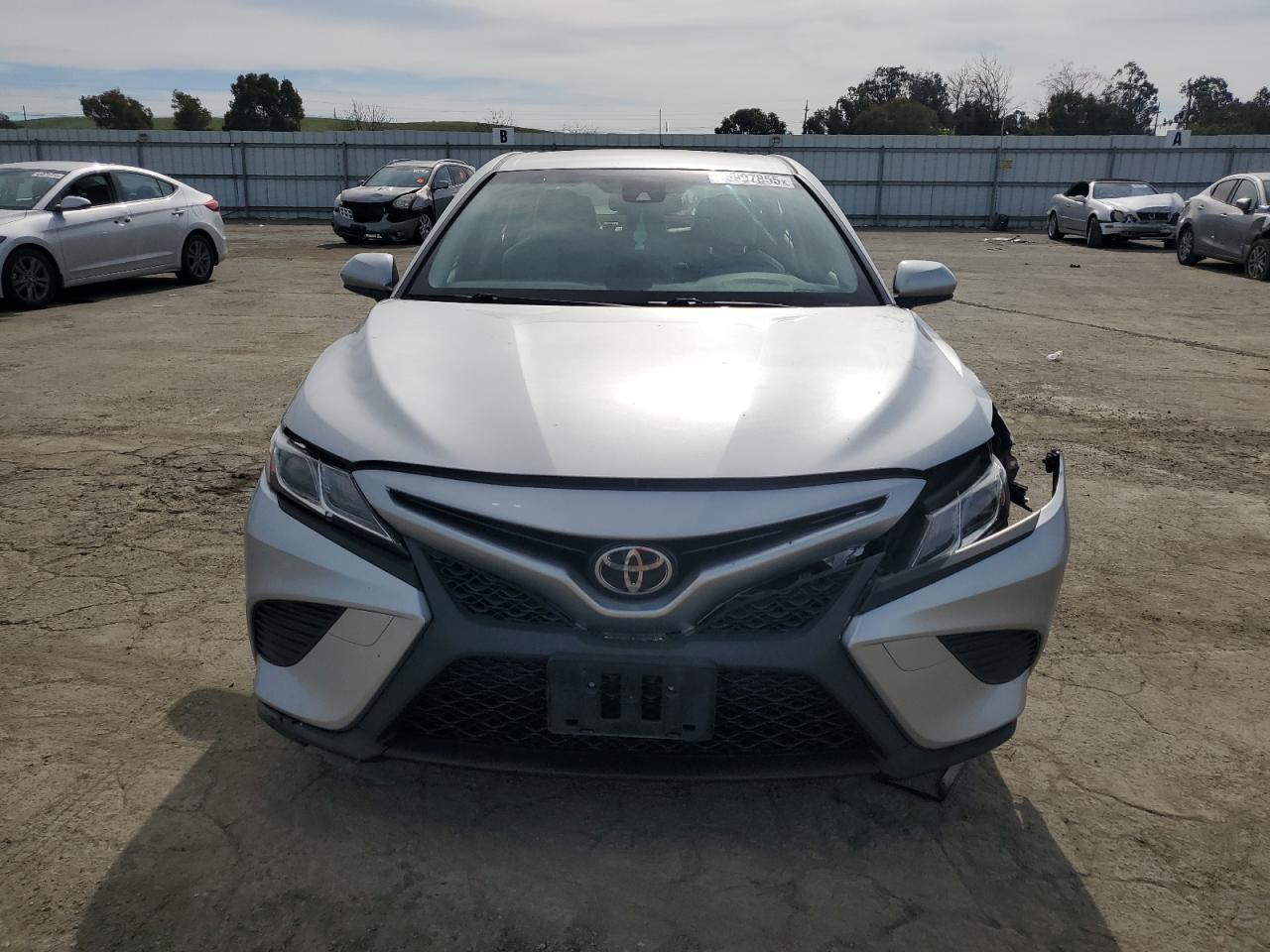 2018 Toyota Camry VIN JTNB11HK7J3038709 Copart auction photo, front end damage thumbnail 5