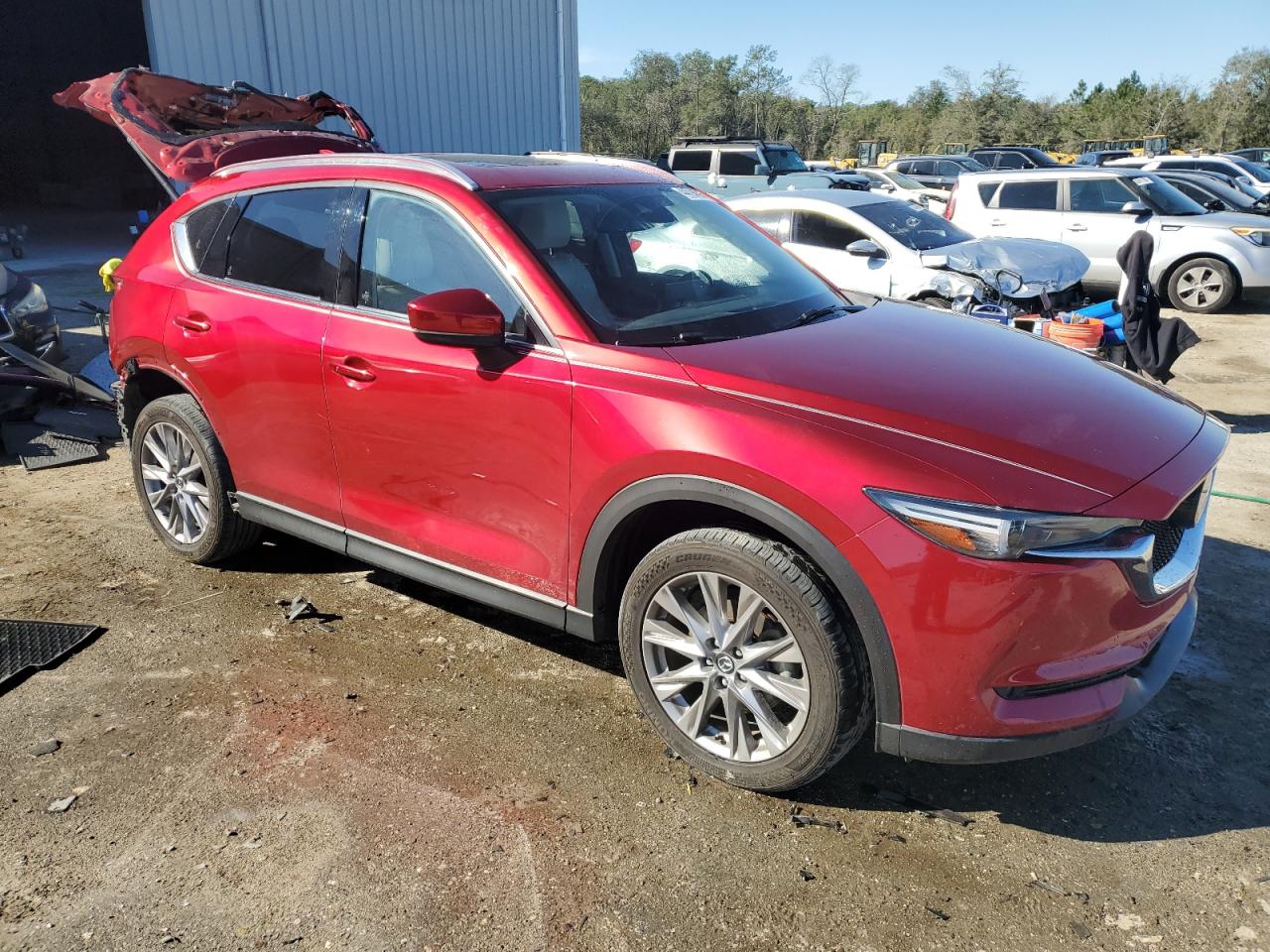 2021 Mazda CX-5 VIN JM3KFBAY3M0301513 Copart auction photo, rear end damage thumbnail 4