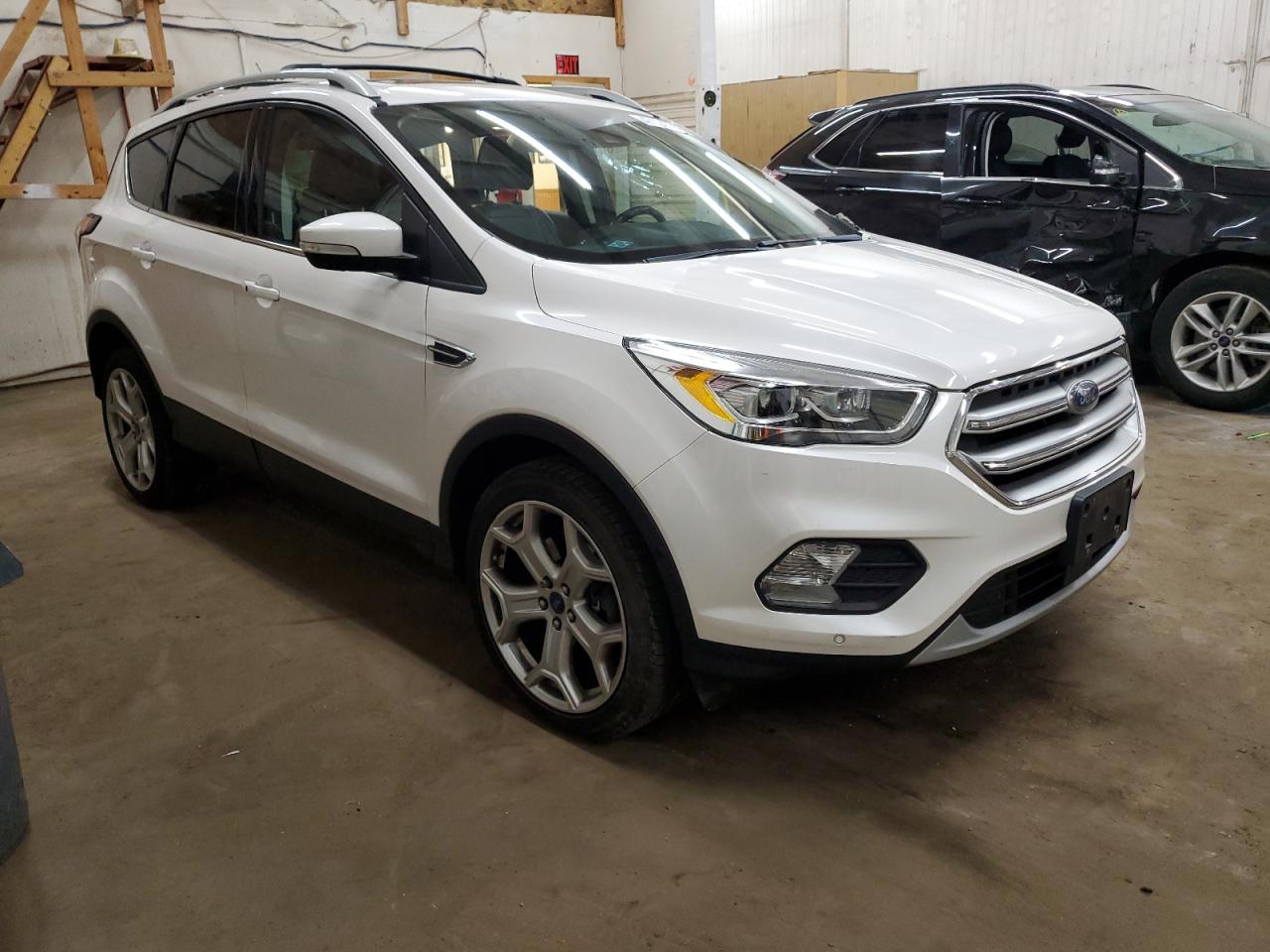 2017 Ford Escape VIN 1FMCU9J93HUB86880 Copart auction photo, front end / side damage thumbnail 4
